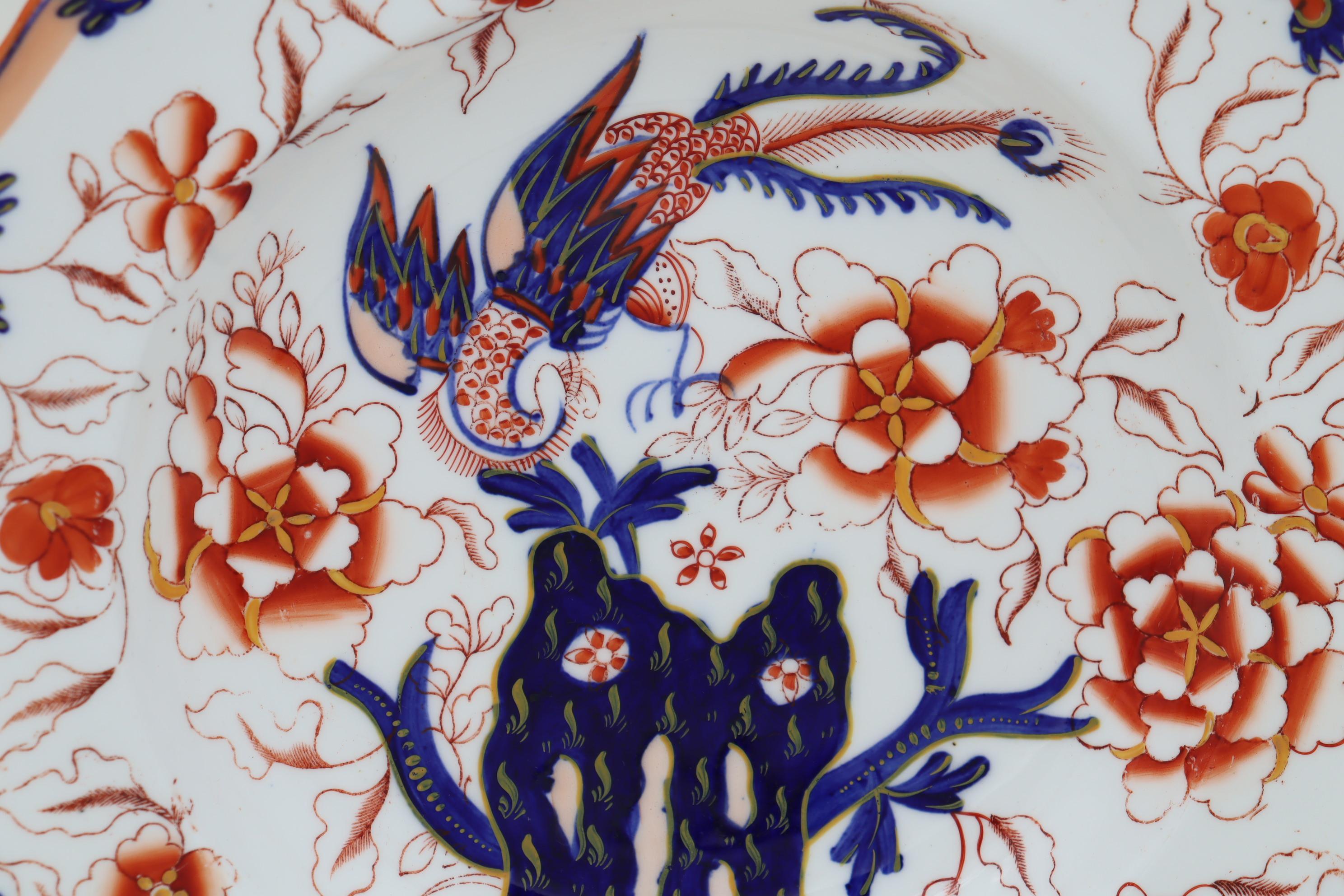 This twenty-three piece porcelain part dinner set consists of 2 larger platters measuring 320 x 26 mm (12.5 x 10.25 inches), 2 smaller platters measuring 285 x 238 mm (11.256 x 9.5 inches), 8 dinner plates 265 mm (10.5 inches) in diameter, 6 bowls
