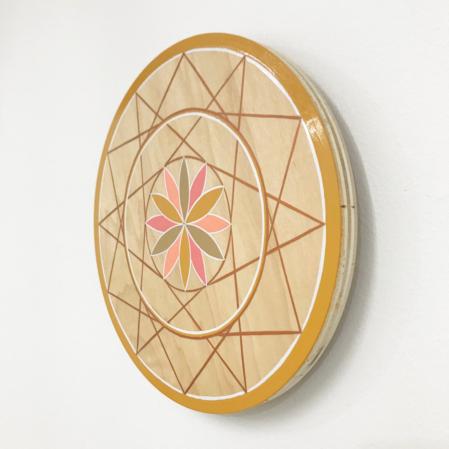 This wall hanging by Scott Chasse is adorned with a hand-painted pink, peach and gold toned design rooted in the sacred geometry of the flower of life. 

One-shot enamel hand-painted on plywood

Measures: 11.75” diameter, painted on 3/4” plywood