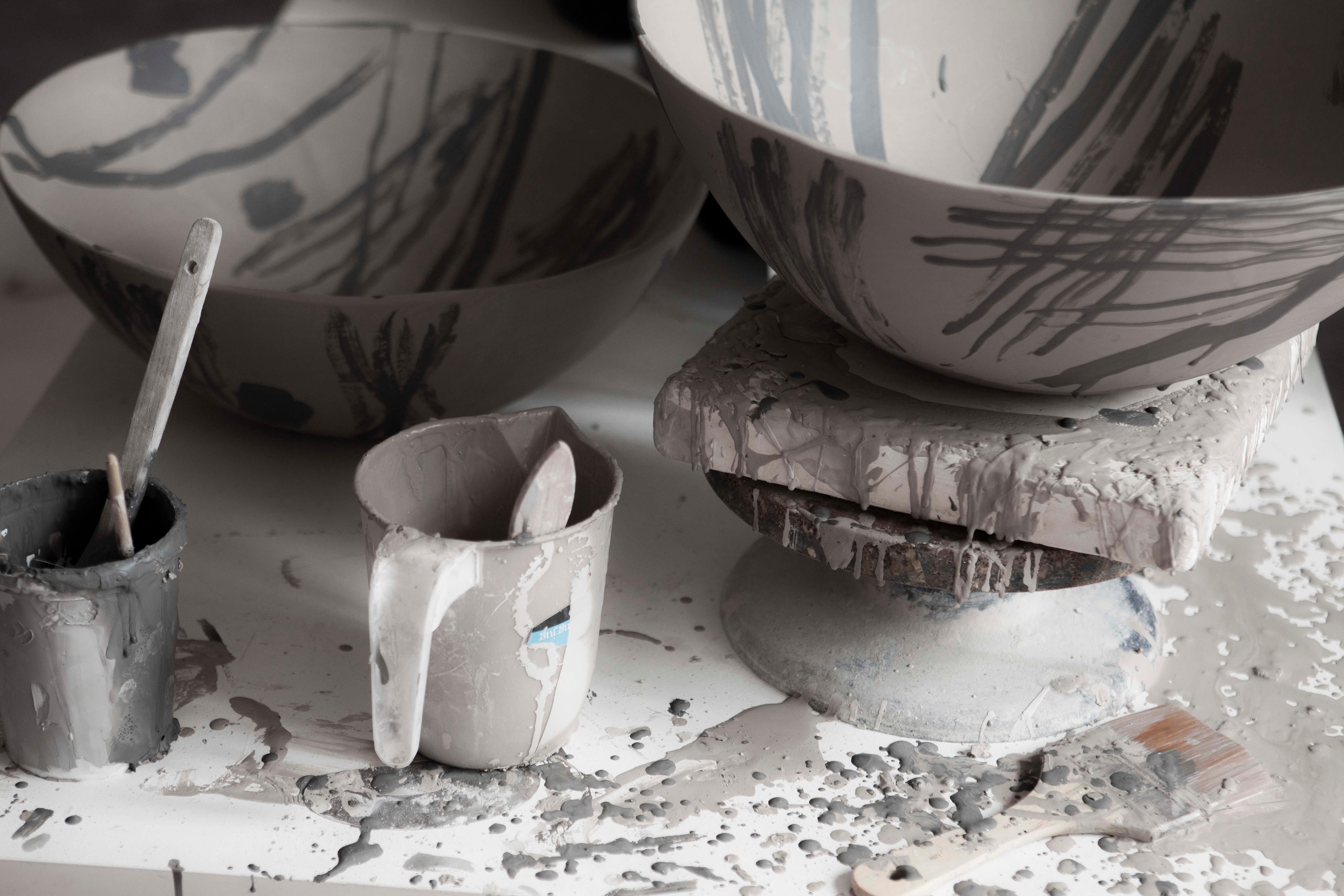 Acclaimed conceptual artist Bruce McLean debuts a vast new body of work titled Garden Ware that was exhibited at the Victoria and Albert Museum in London. The collection includes one-off earthenware creations by McLean, including vases, bowls,