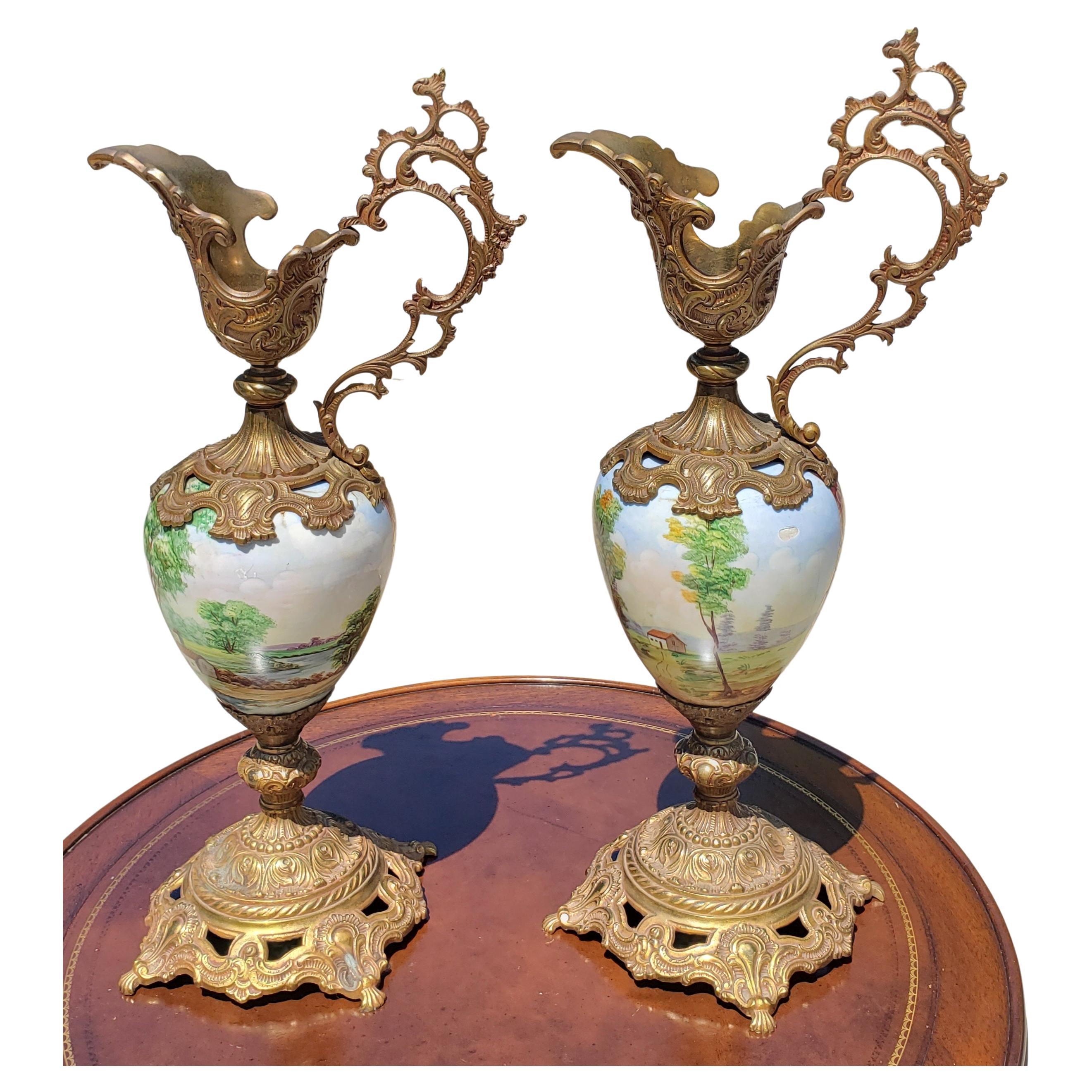 Hand Painted Porcelain and Brass Mounted Ewers, a Pair For Sale