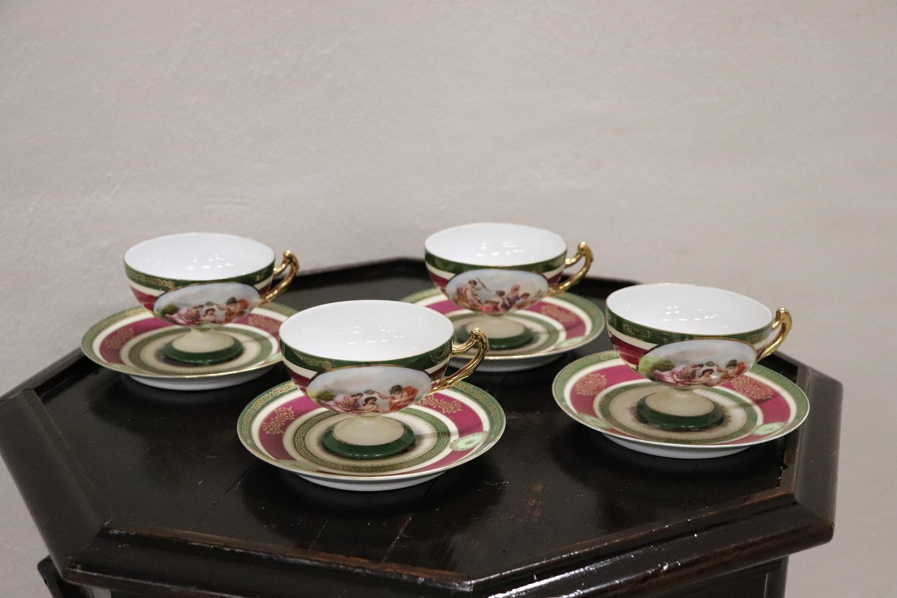 Beautiful fine porcelain tea and coffee set 8 pieces signed Royal Epiag, Czechoslovakia, 1930s. The service is complete to serve four people at the table includes: four cups with plates underneath. Refined hand painted decoration of Classic taste