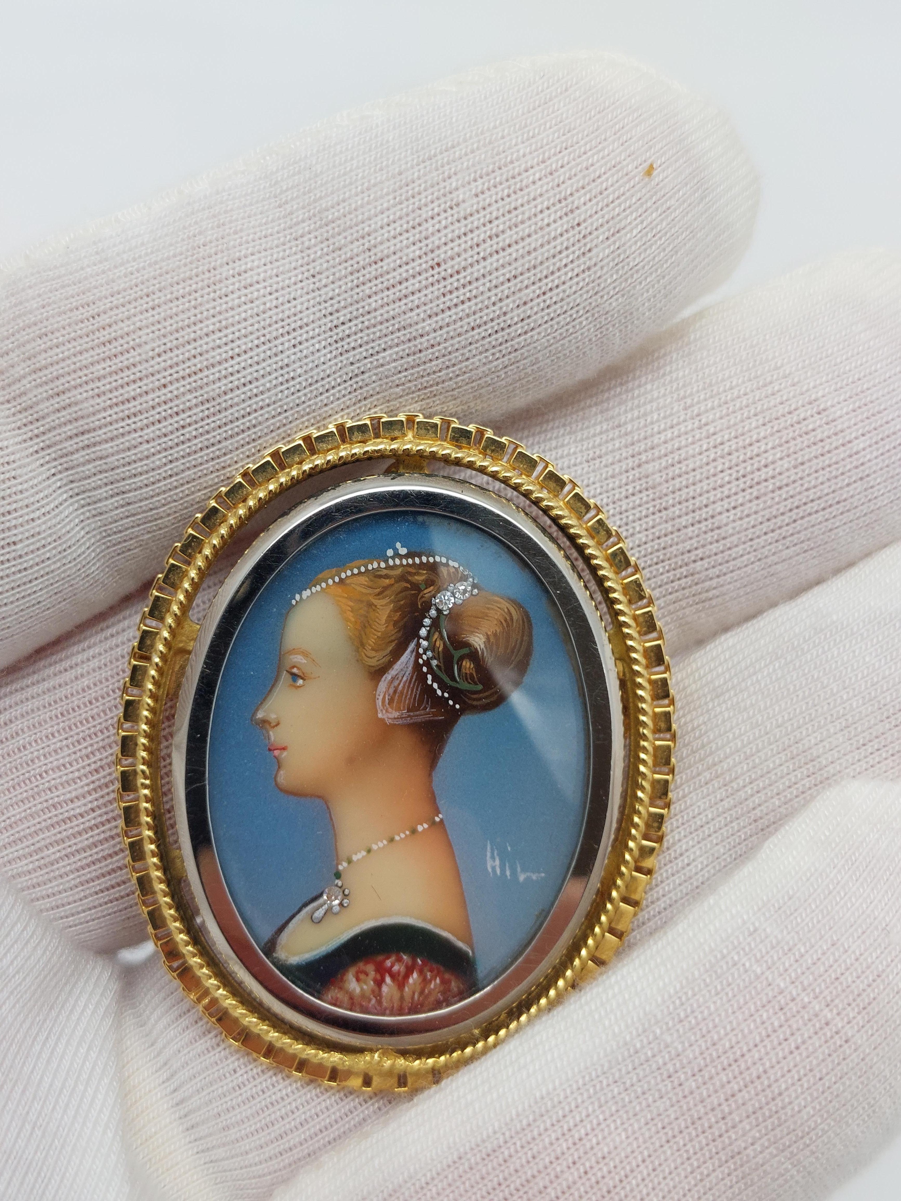 Regal...........

Medidas del alfiler/colgante de porcelana pintada a mano en oro amarillo de 18 quilates   1  9/16 