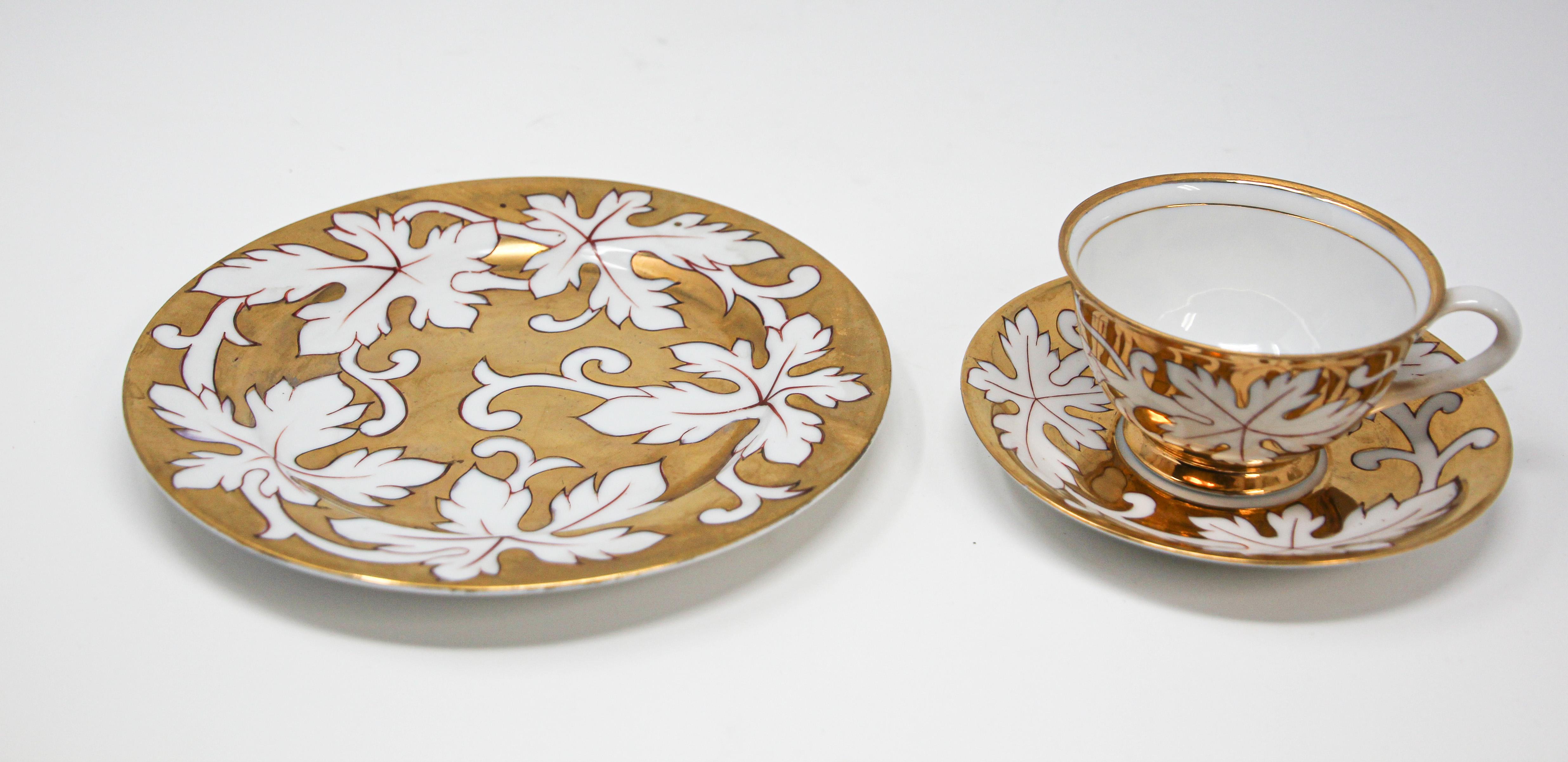 Fine gilt original porcelain coffee or tea cup with saucer and desert plate.
Enjoy the start to your day with the classical sophistication of this fine porcelain gilt trio coffee, tea set.
This hand painted set are crafted of fine porcelain and