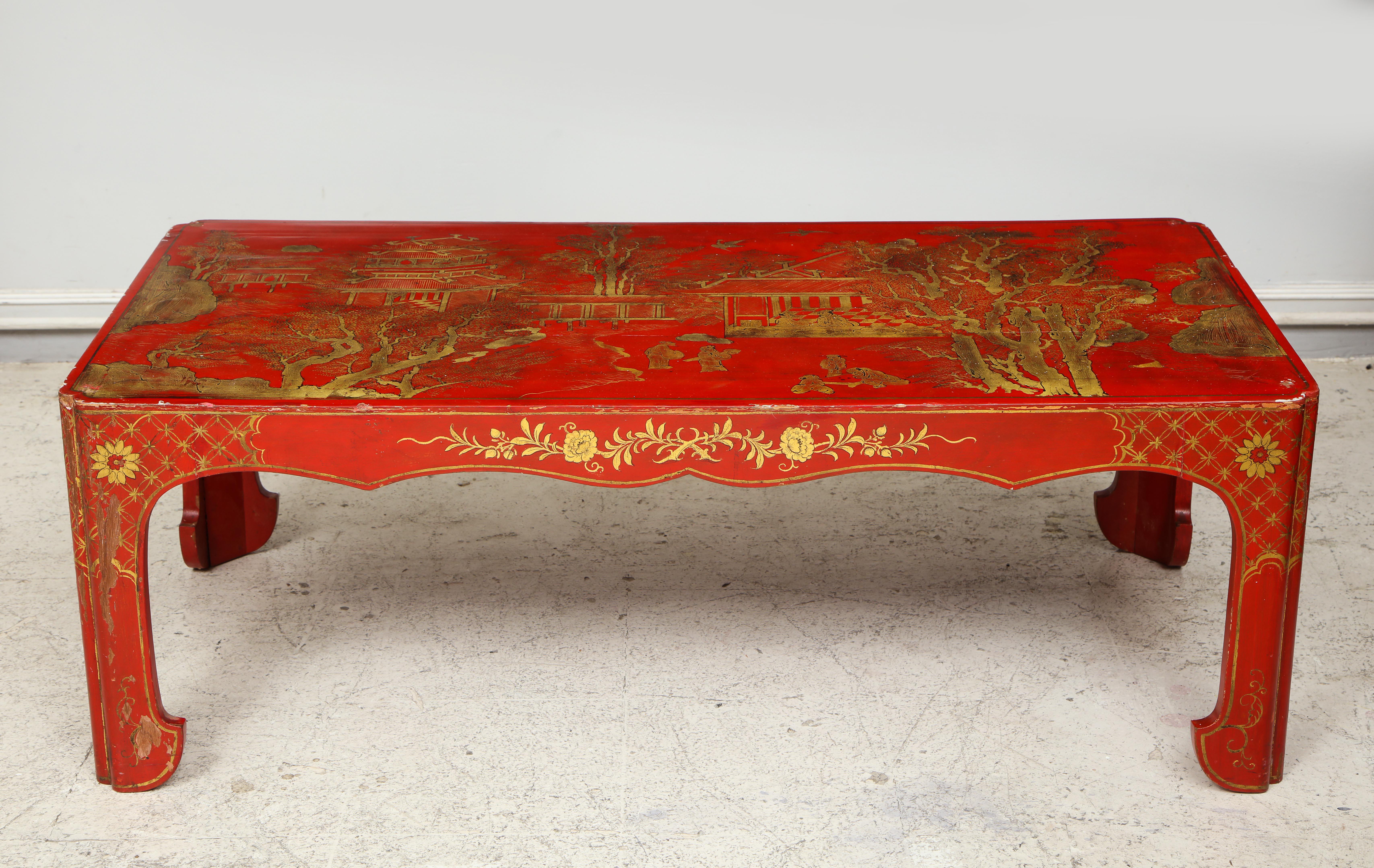 Hand painted red lacquered chinoiserie cocktail/coffee table.