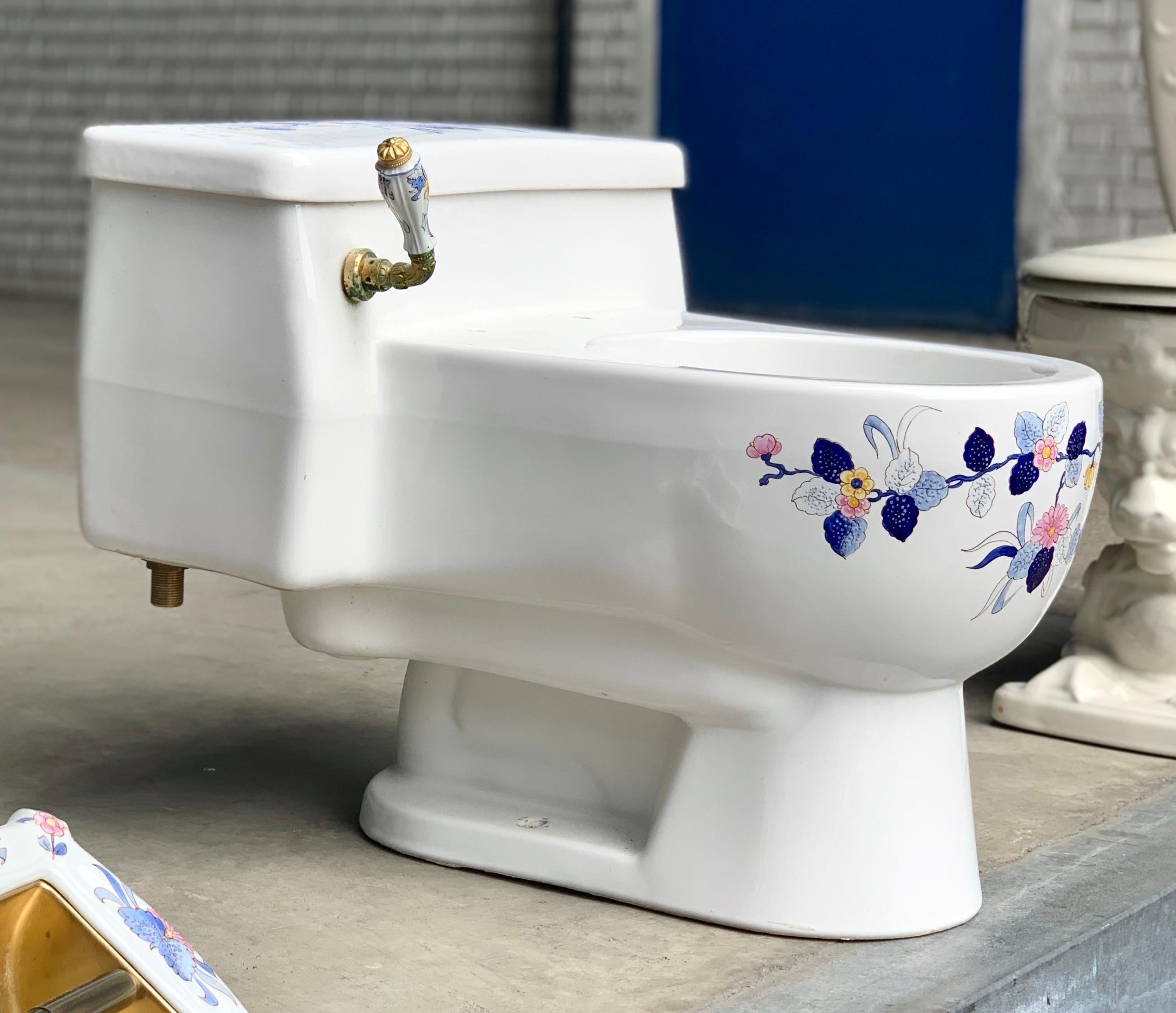 Hand painted Sherle Wagner porcelain chinoiserie ‘Blue Mum’ toilet, water closet. Blue mum pattern still available at Sherle Wagner but this gorgeous sculptural low-slung one piece toilet form is no longer in production. Comes with original gold