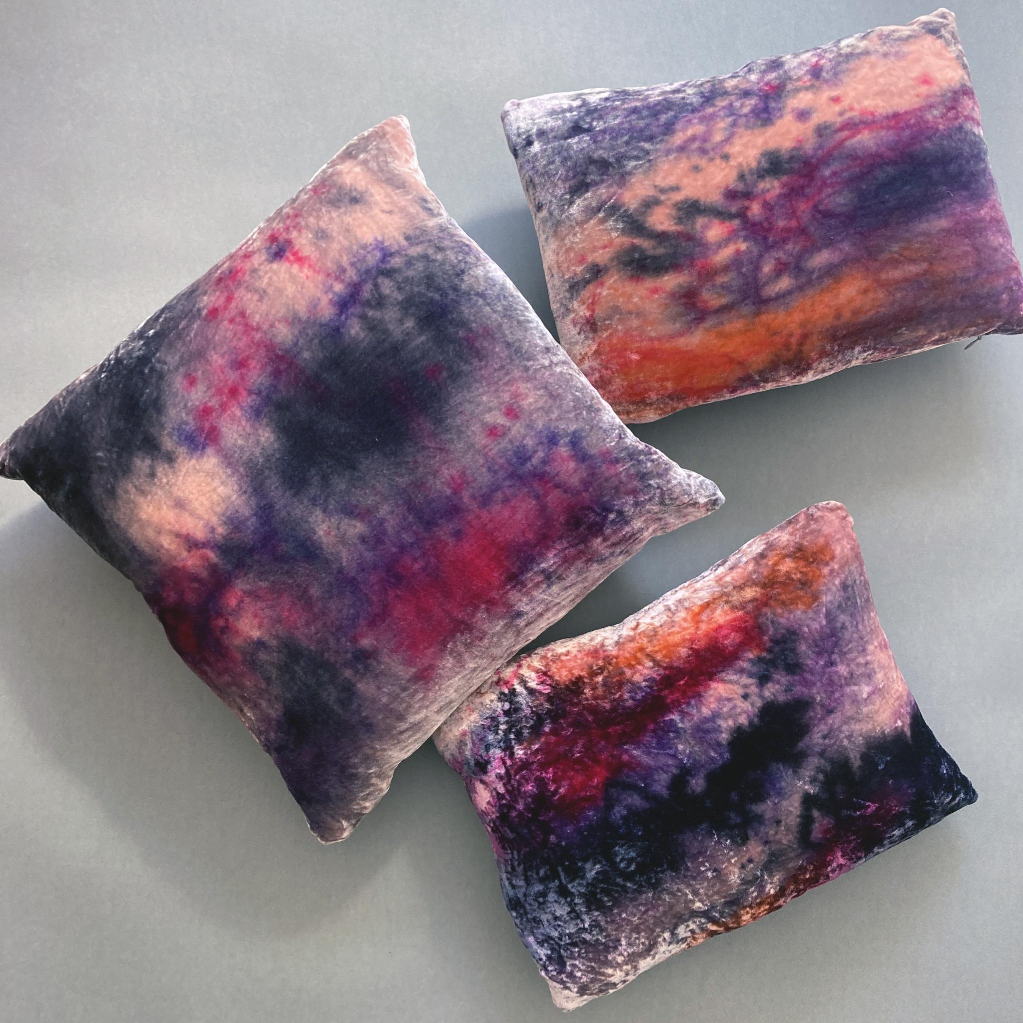 Rose velvet pillow dyed with magenta, purple, orange, blush and navy in an abstract pattern with gray linen backing. Hand-painted and sewn in New York City, down pillow insert made locally in NYC. Pillow measures 12 x 16 inches. Each velvet pillow