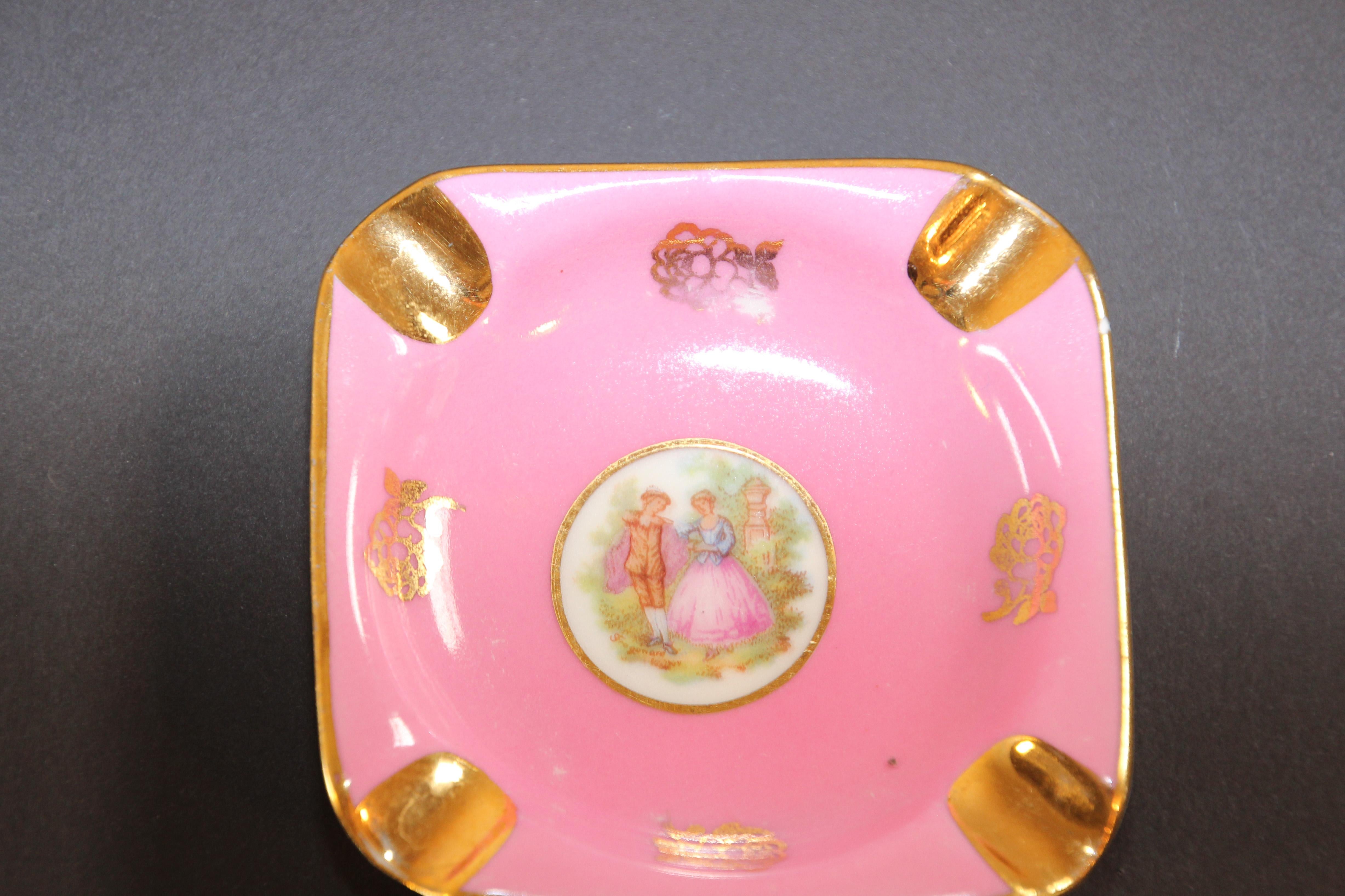 Pair of vintage Bavaria Germany porcelain ashtrays
Elegant precious porcelain ashtrays hand painted couples in the style of Fench artist Fragonard.
One ashtray in royal blue and one pink with gold.
Use it as an ashtray or for decorative