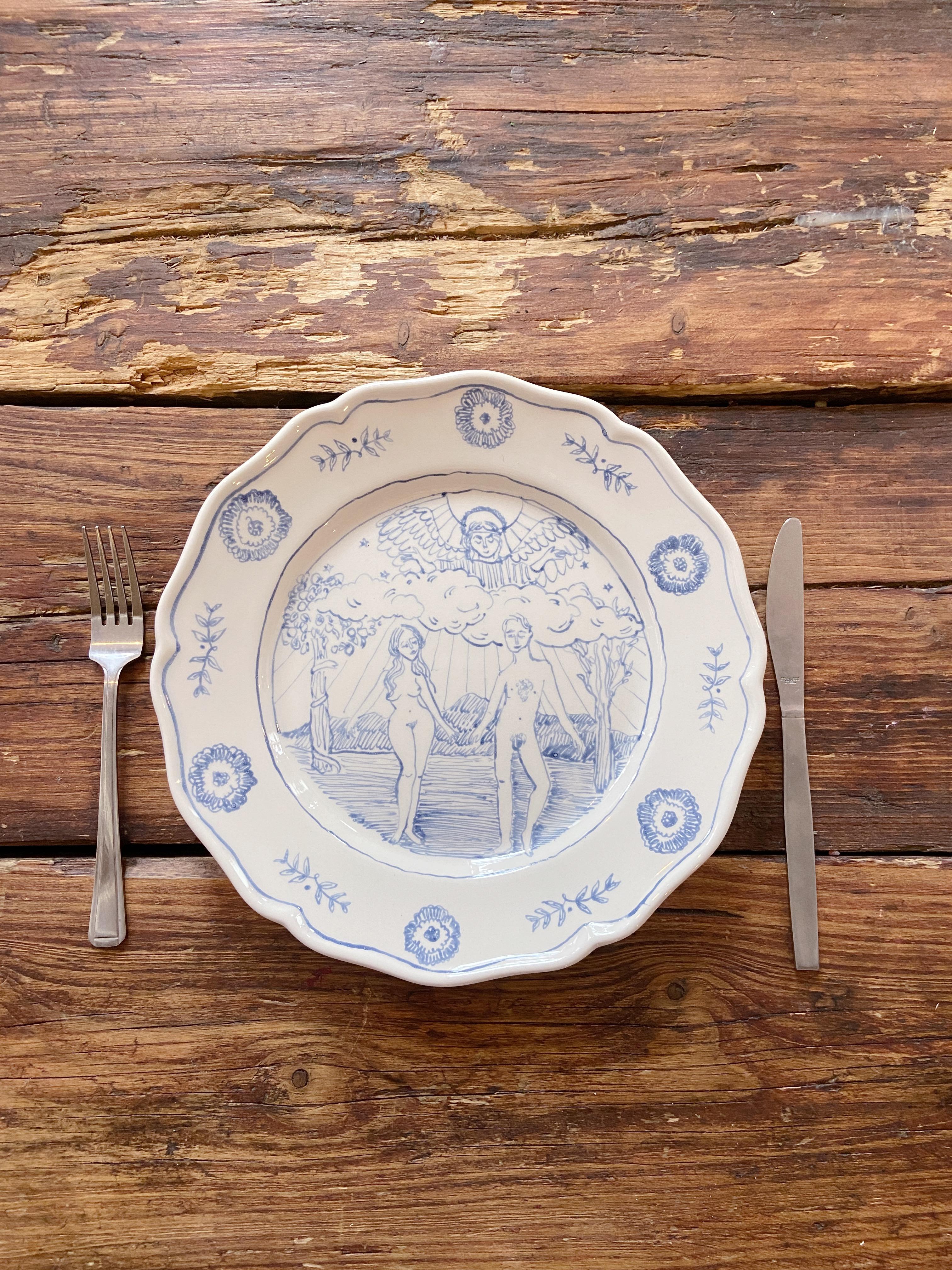 Hand painted onto luxury Italian Ceramic by artist Josephine Dessine. This unique blue and white plate is hand painted and kiln fired to create a luxurious decorative or serving piece to adorn any dining experience. 

Inspired by the Delftware of