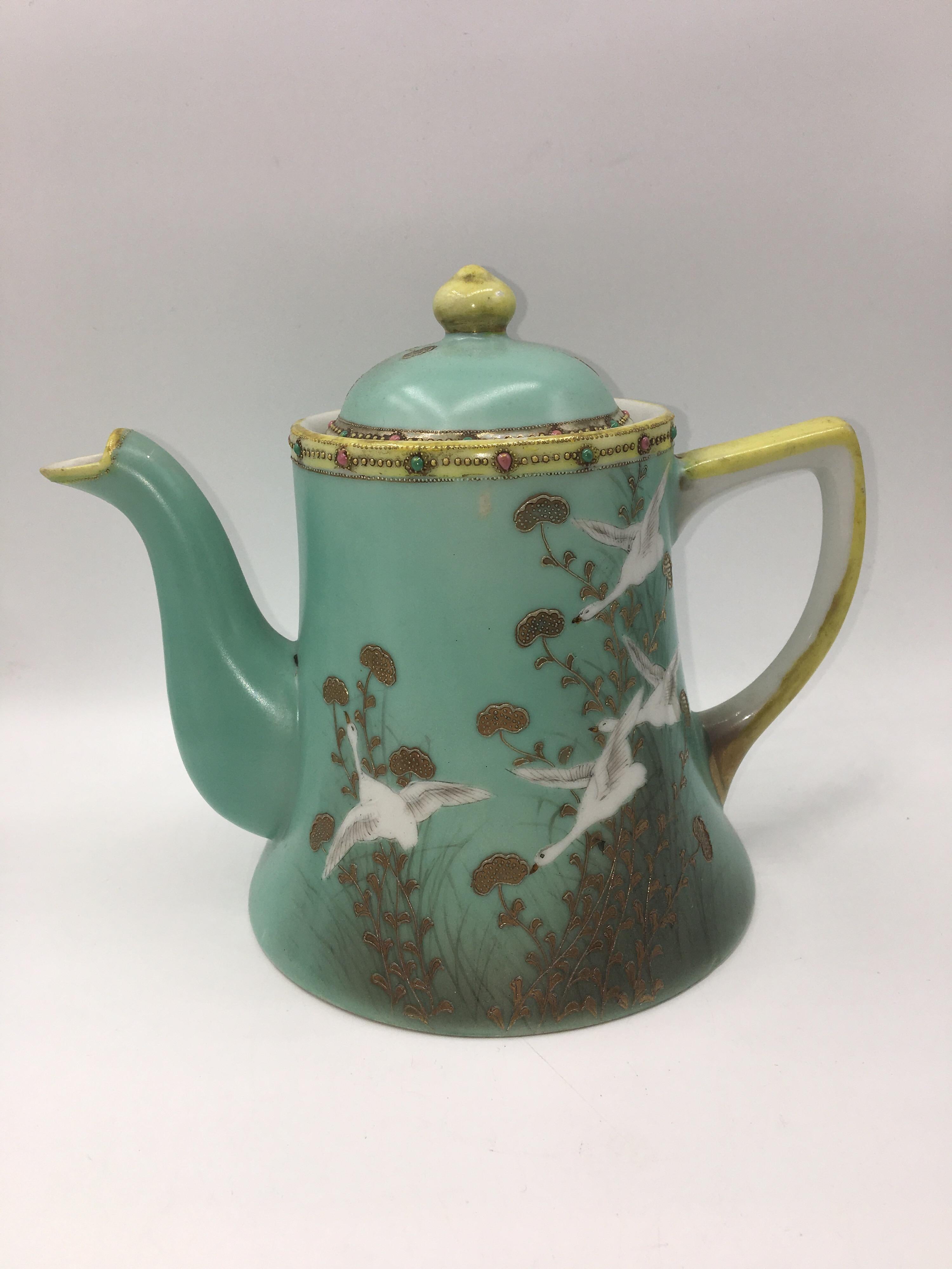 Beautiful hand painted green Japanese tea set with embossed details, from the 1950s.