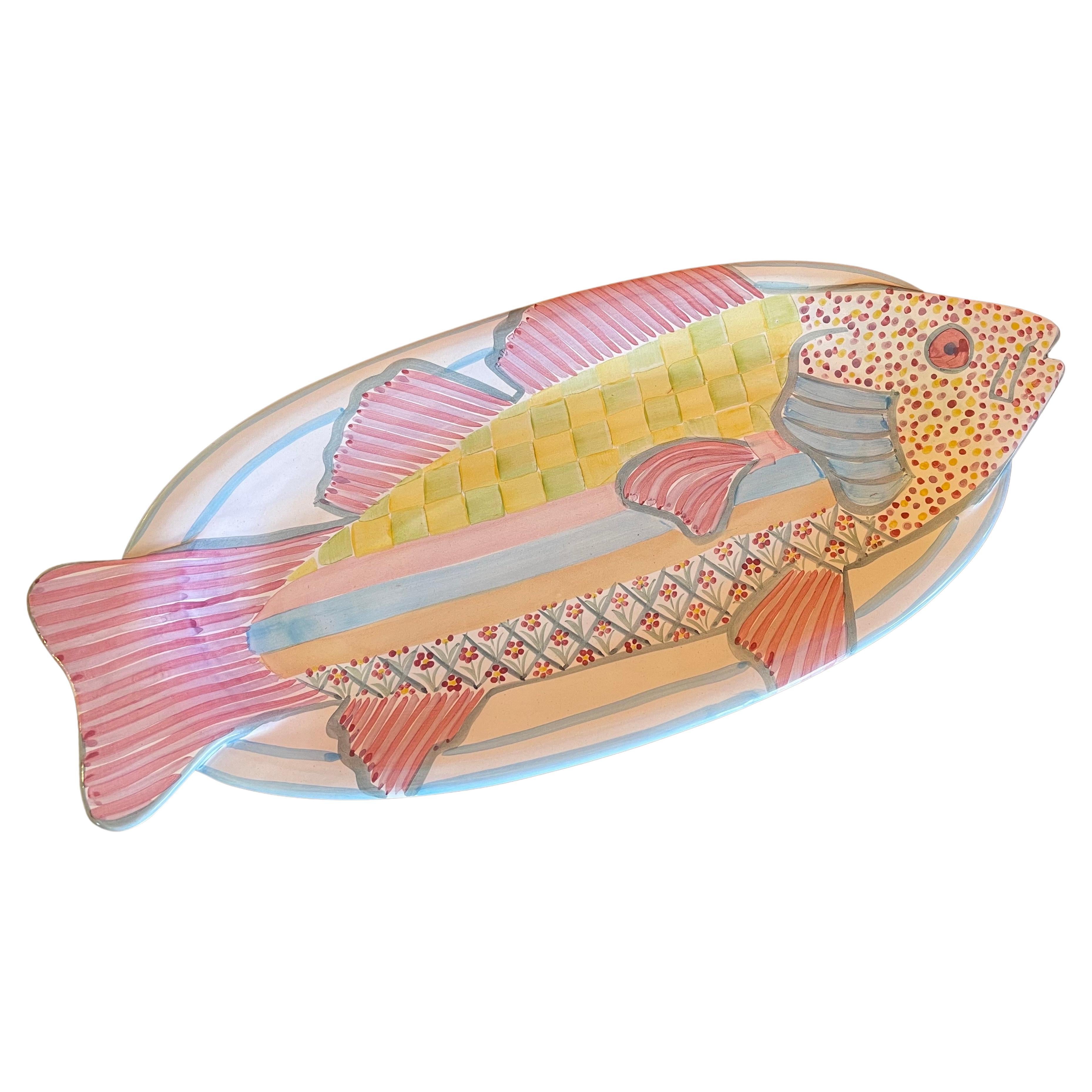 A nice hand painted terracotta fish platter by McKenzie Childs, circa 1983. The platter is in very good vintage condition with no chips or cracks and measures 24.5