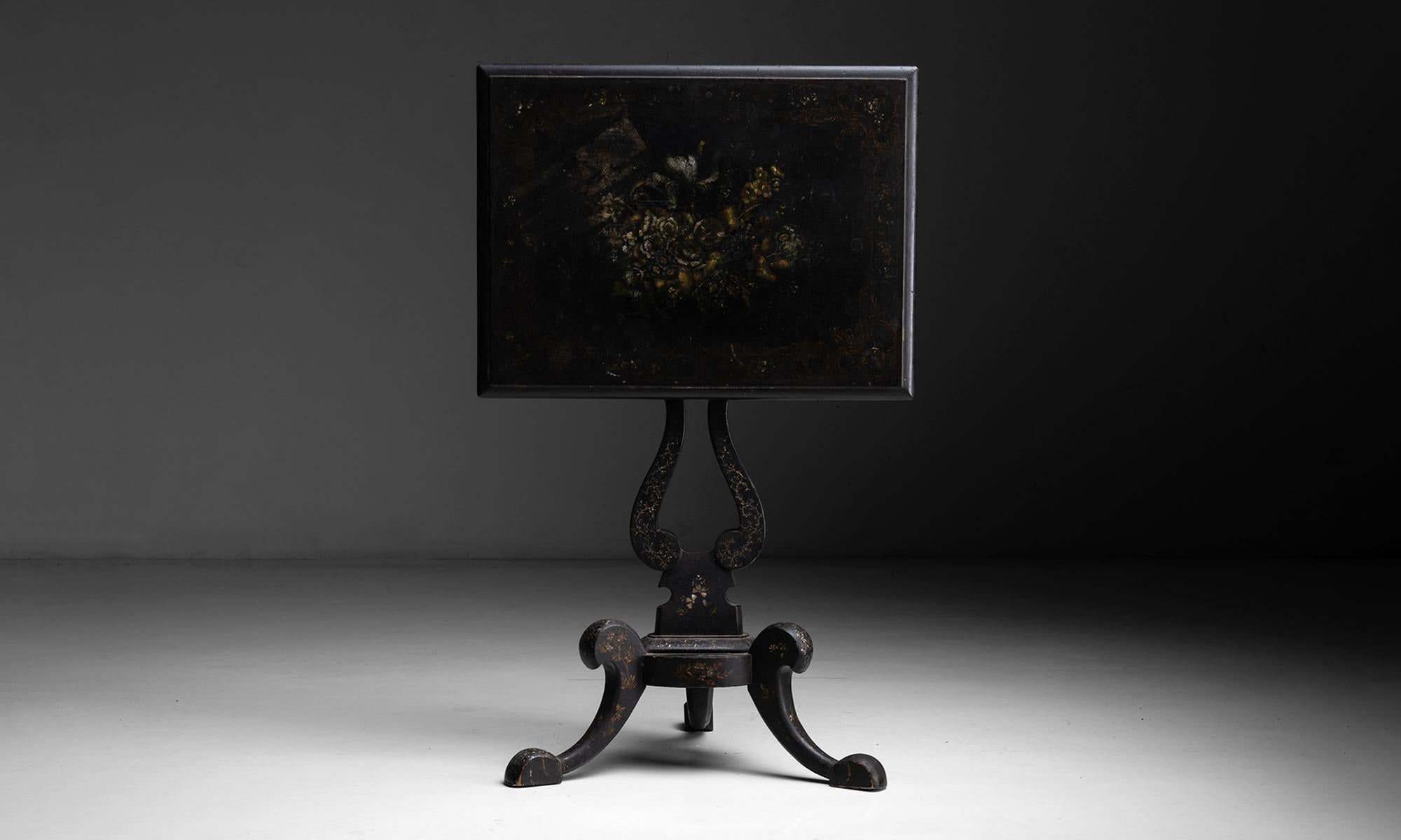 Hand painted tilt-top table

England, circa 1870

Elegant side table with hand painted floral decoration and mother of pearl inlay.

Measures: 24”L x 18.25”D x 27.25”H.