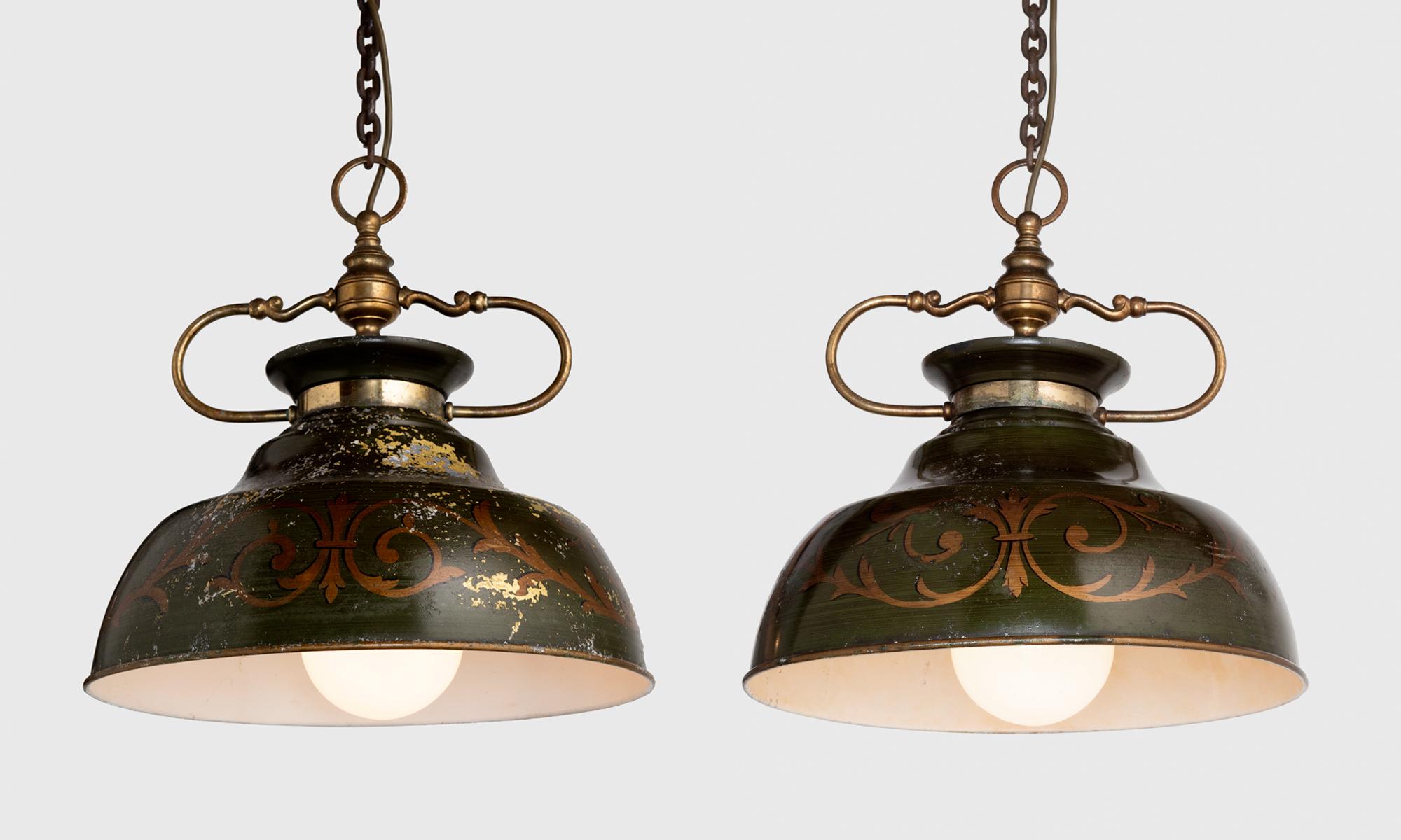 Hand Painted Tole Pendants, France, circa 1910

Ornate detailing in green and gold paint on metal shades with brass hardware. One of the four pendants is heavily patinated, differing from the other three.