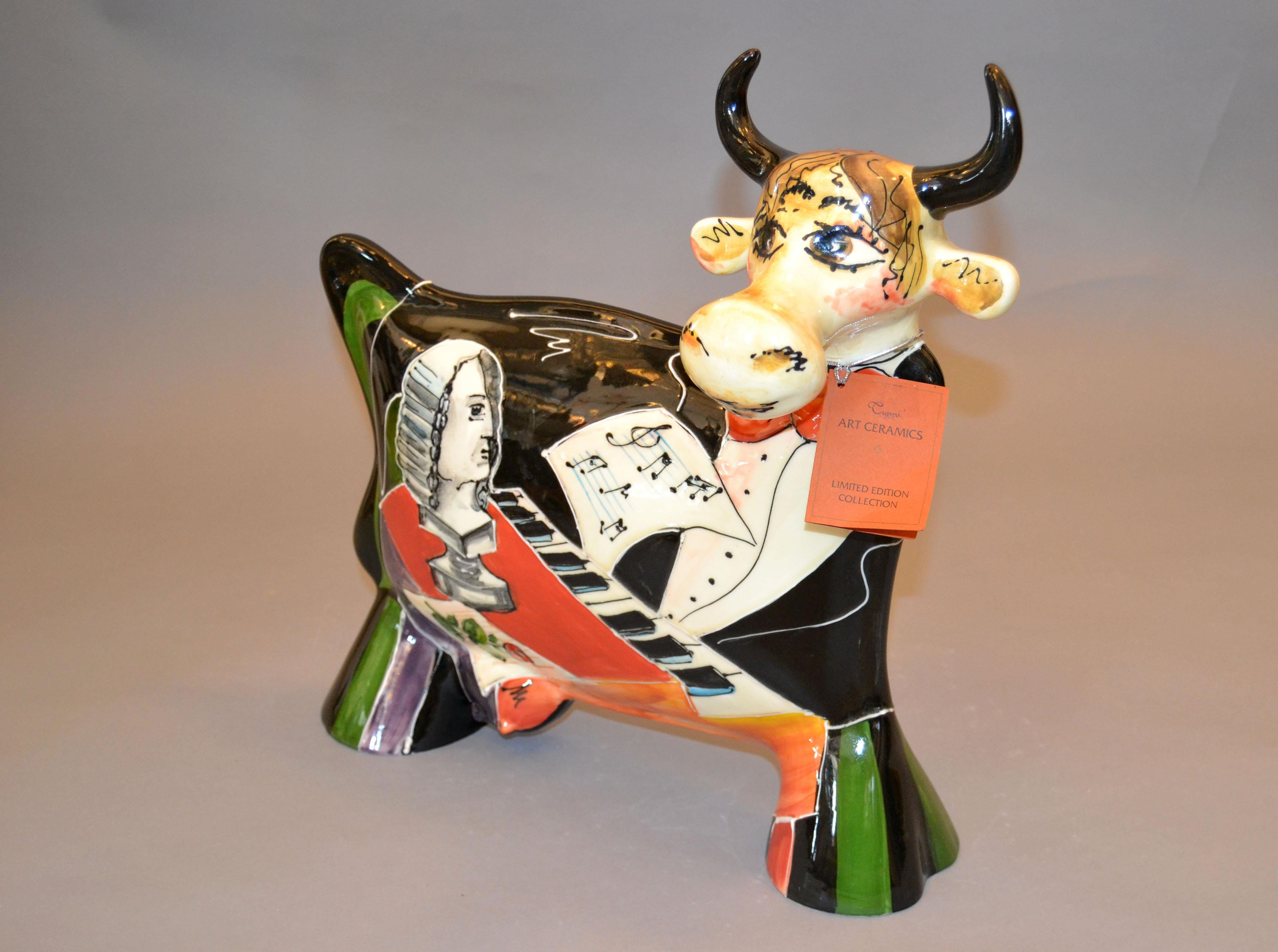 Modern hand painted art ceramic cow by Turov.
The cow shows a scene of 'classical music' with Piano and Bust.
Studio Turov Art presents the unique artistic ceramics which pays strict attention to details.
Each ceramic piece from this collection