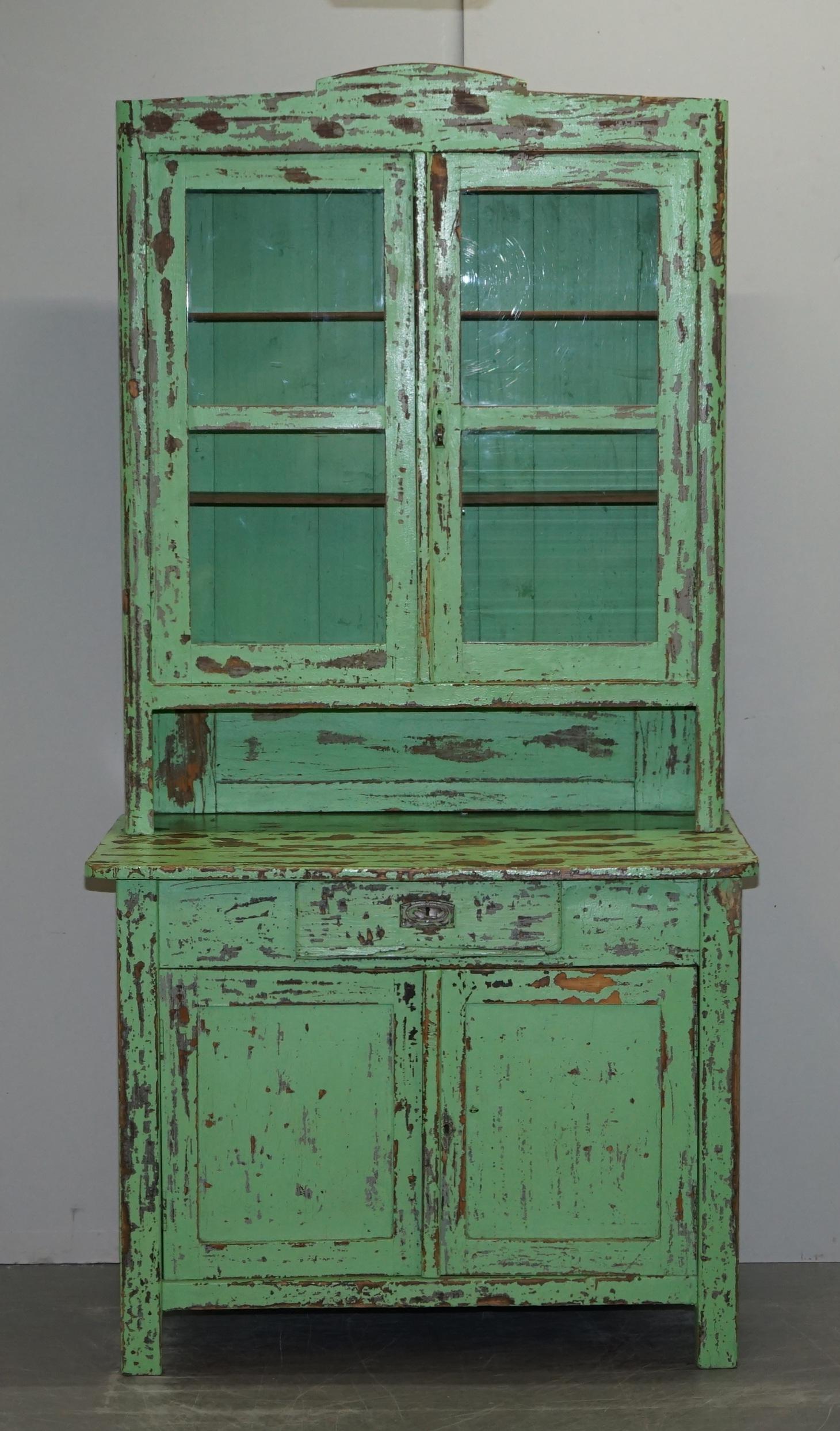 We are delighted to offer for sale this very well made hand painted distressed Victorian kitchen cupboard with bookcase top, cupboard base and single cutlery drawer

A beautiful example of a unique piece of art furniture. Original paint pieces
