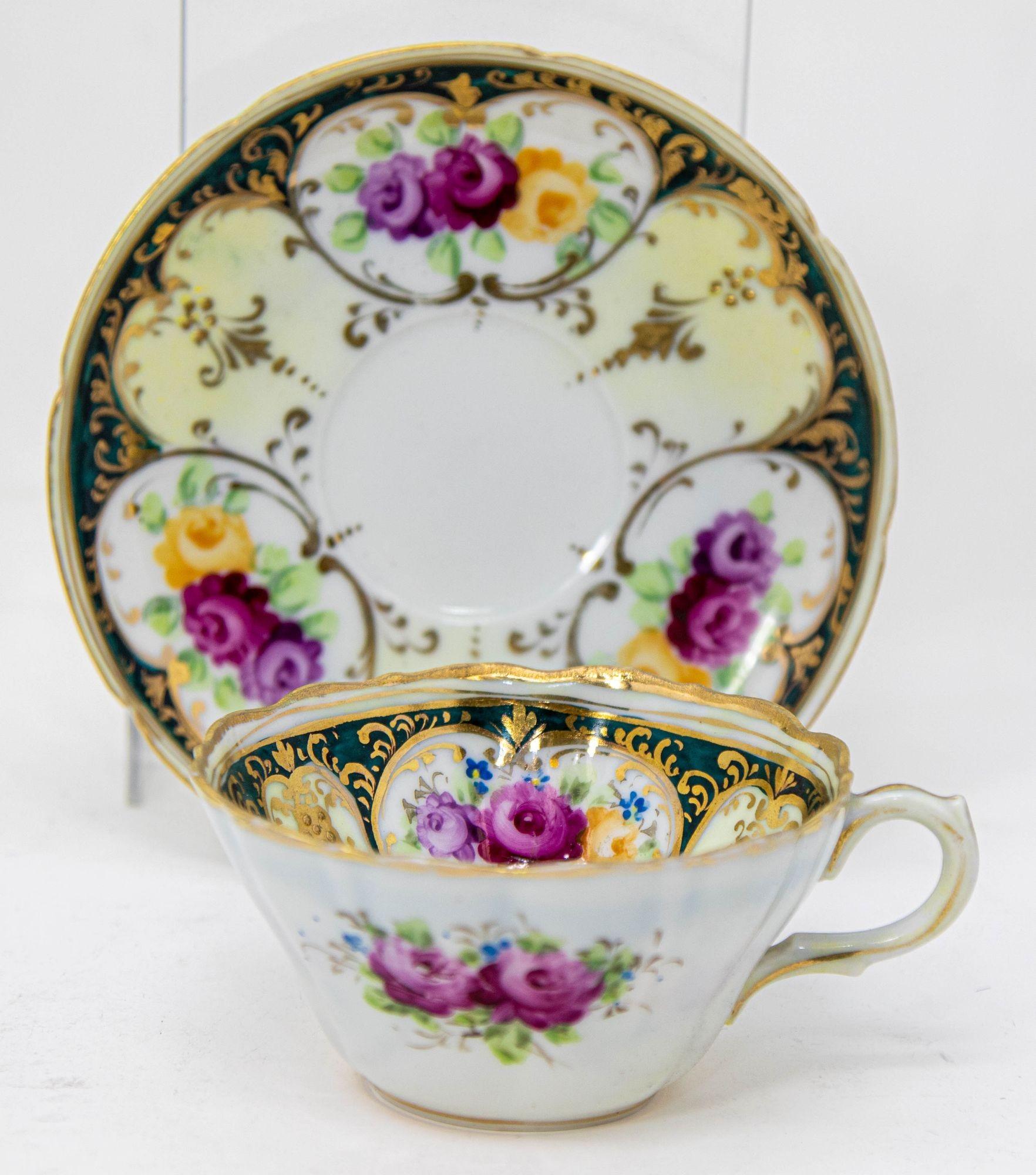 Antique Victorian English Porcelain Tea Cup set Gold Art Nouveau Style.
Rare antique porcelain hot pink and gold cup and saucer finely hand-painted with floral design.
Cauldon England style featuring hand-painted floral cartouches in a pretty hot