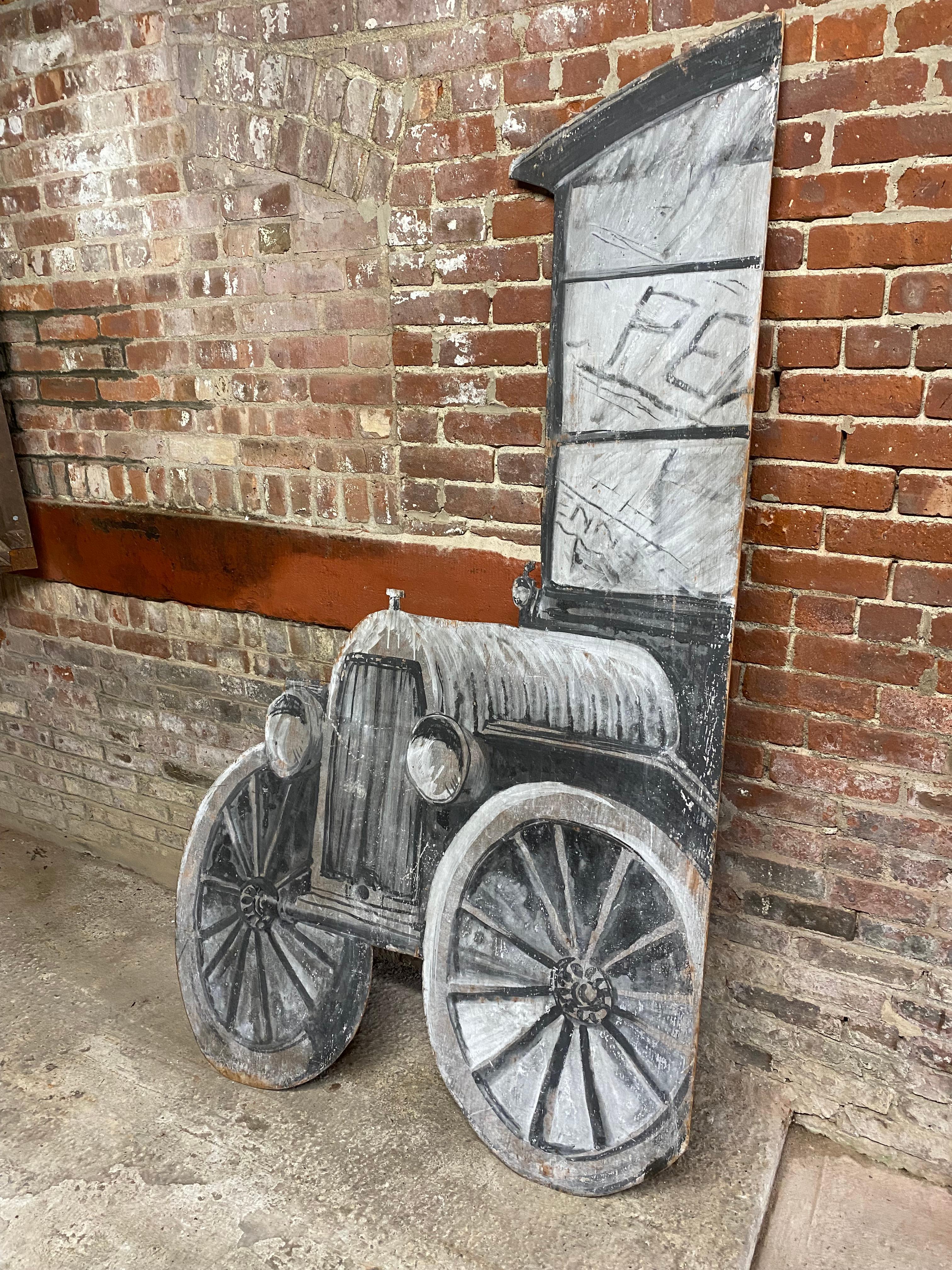 Spectacular hand-painted theater background prop. Painted in a monochromatic palette of black, white and gray. A cut out rendering of a front end of a Ford Model-T truck. This theater prop came from an Upstate New York community theater company.