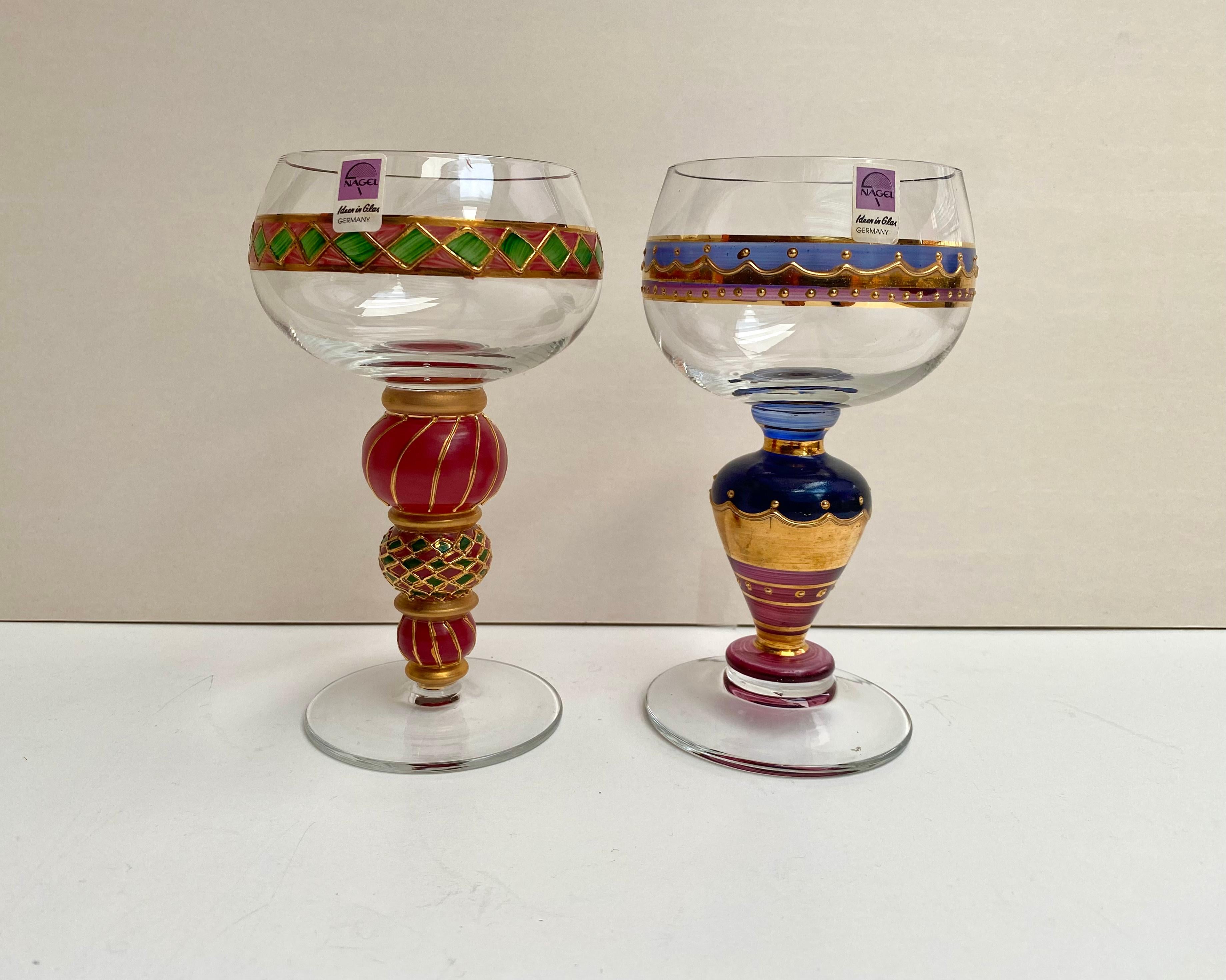 Rare pair of vintage glasses from Nagel, a long-established glassware manufacturer in Germany, 1980s.

Because the enamel design is baked on hand blown glass and painted, it has a color finish similar to stained glass. Very nice designer