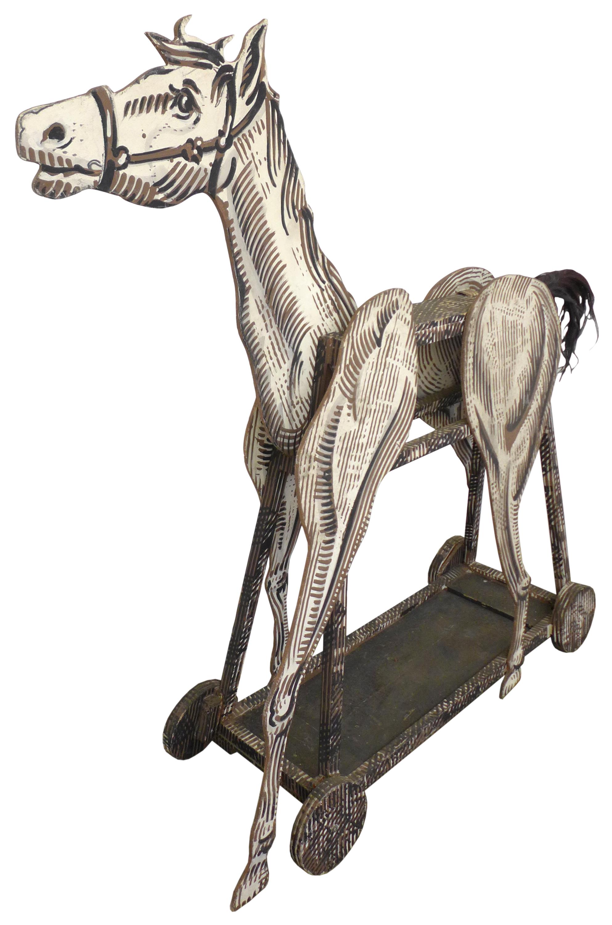 An incredible, unusual, hand-painted-wood horse sculpture. A semi-knock-down construction, six plywood appendages, including a tail of real horse hair, attach to the central rolling cart 