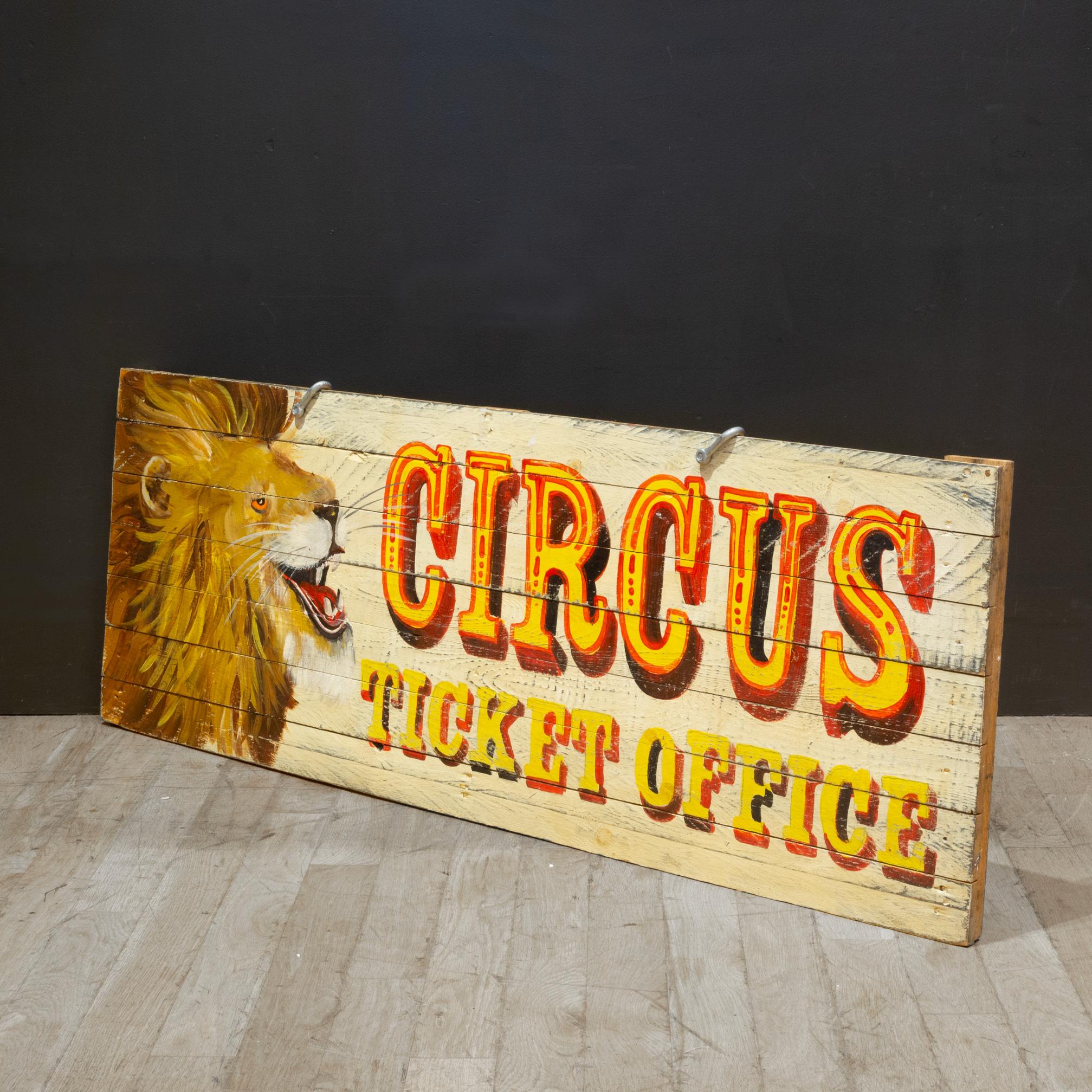 ABOUT

A hand painted circus ticket office sign. 

    CREATOR Unknown.
    DATE OF MANUFACTURE c.2000-2005. 
    MATERIALS AND TECHNIQUES Painted Wood. 
    CONDITION Good. Wear consistent with age and use.
    DIMENSIONS H 20.25 in. W 56 in. D