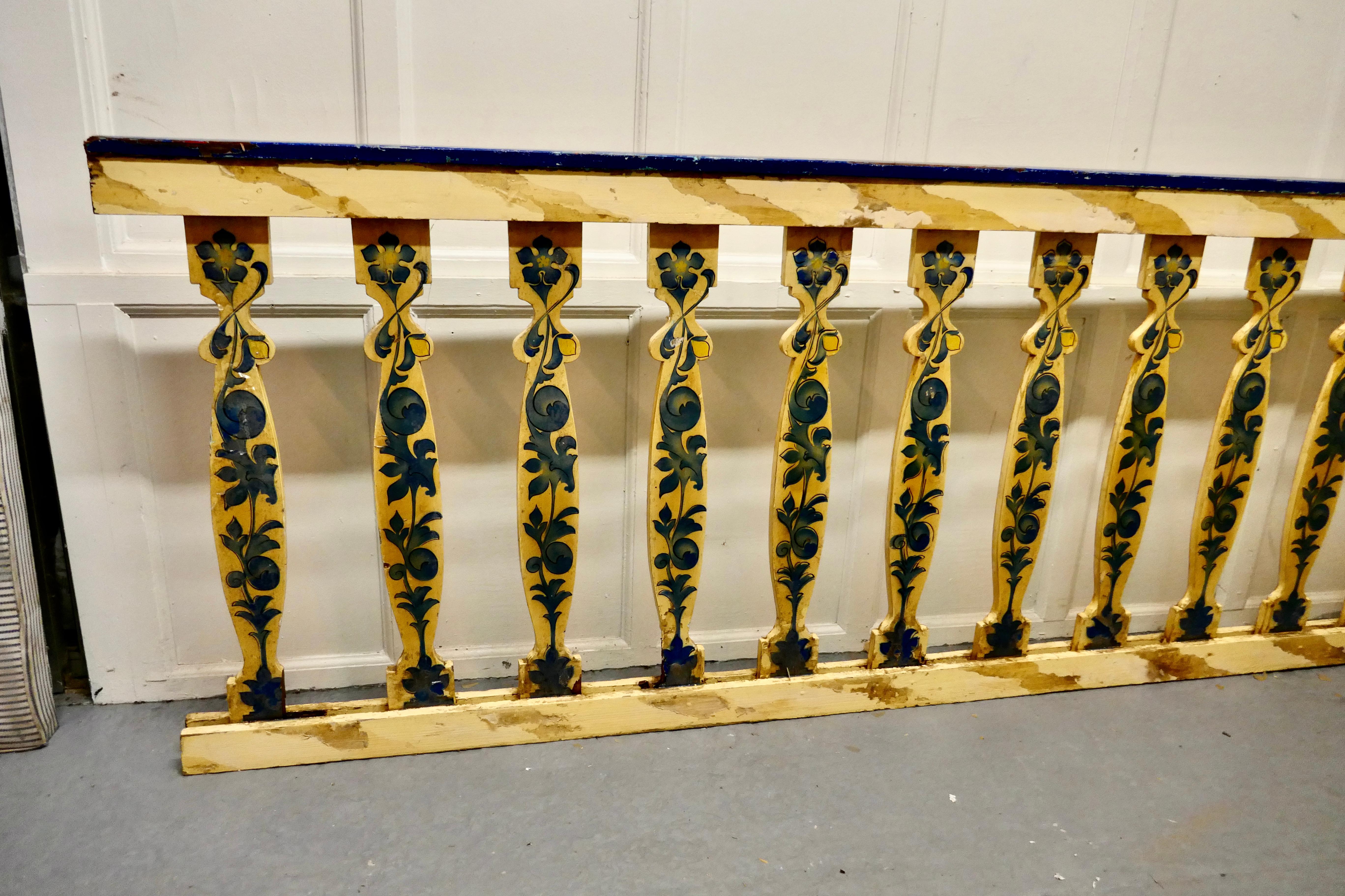 Hand painted wooden railings from a fair ground

Great decorative pieces, there are 2 of these one 5ft long and the other 8ft
Each has a 3.5” wide top rail, the shaped balusters are set in a heavy base 

The decorative paint is in good