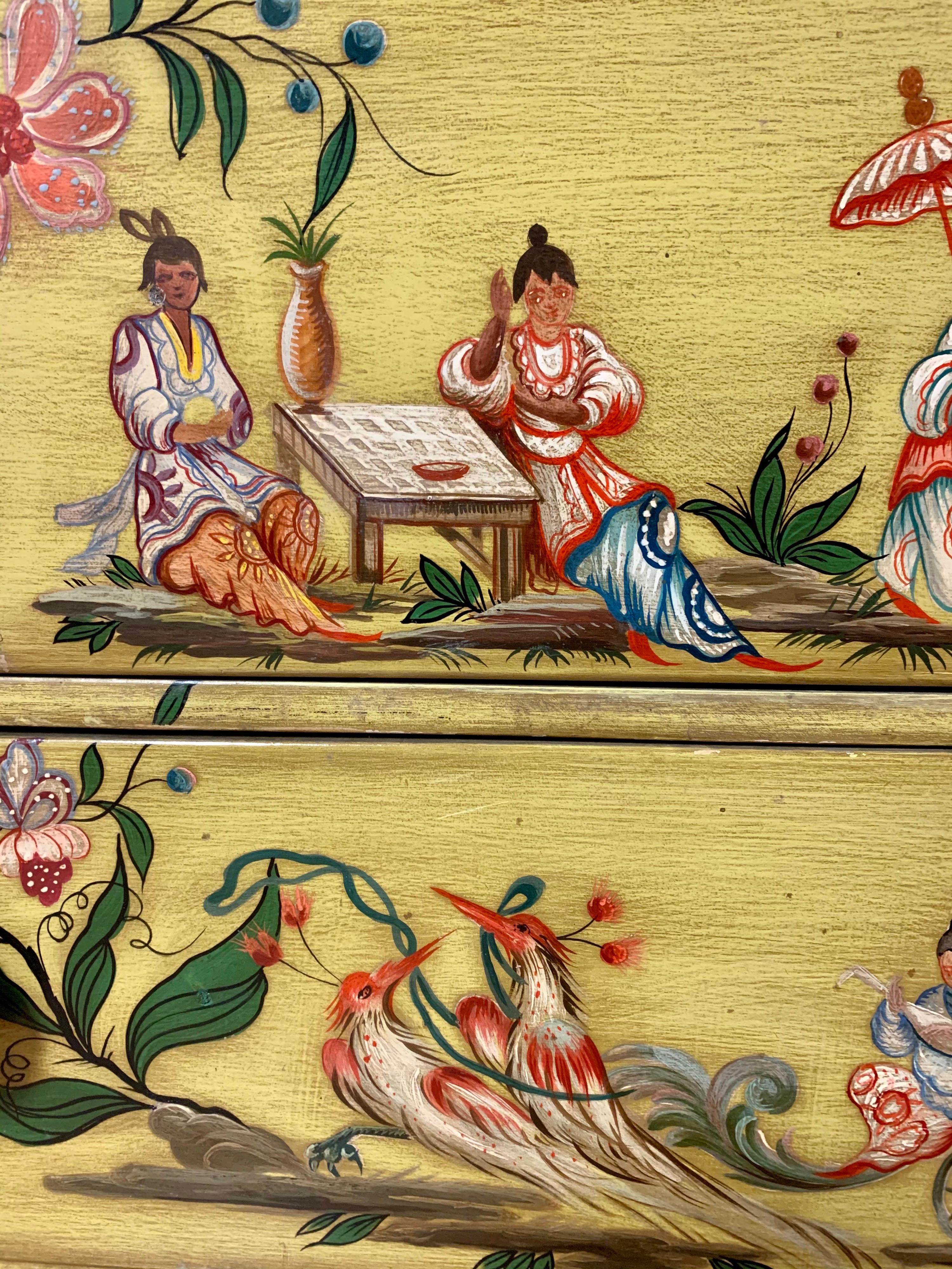 Exquisite hand painted yellow chinoiserie bombe chest with gorgeous painted scenes at front, top and sides. Solid wood construction with dovetailed drawers and red interior paint. Quality craftsmanship, style and detail, circa mid-20th century.