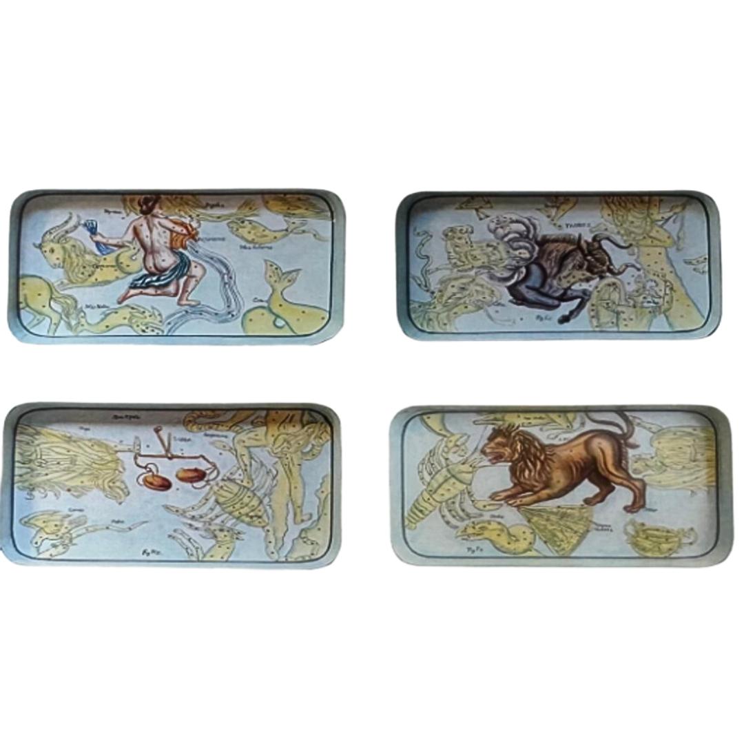 Célébrez le cosmos avec notre ensemble de plateaux en fer peints à la main, chacun peint de manière complexe pour représenter les signes du Zodiac. Parfaits pour un usage décoratif, ces plateaux apportent un charme astrologique et artistique à votre