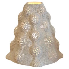 Hand-pierced ceramic lamp forming a dome, by Gilles Caffier signed