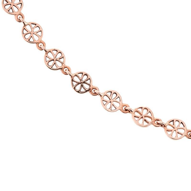 Delicate hand pierced gold sequins chain necklace, featuring our signature precious 18 karat rose gold lace, linked together to form a trail of gold around your neck. Can be worn on its own or by layering other chain necklaces for a more casual