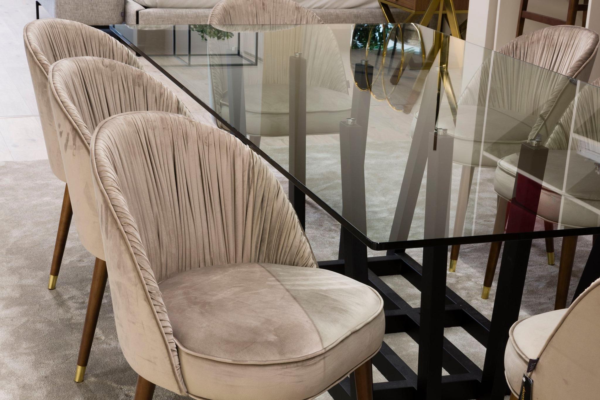 The contemporary dining chair hold a stimulating design, as it holds an elegant combination of handmade couture techniques, wood, and metal. Its water repellent and stain resistant velvet is soft with alpaca wool look and feel.
Curved back featuring