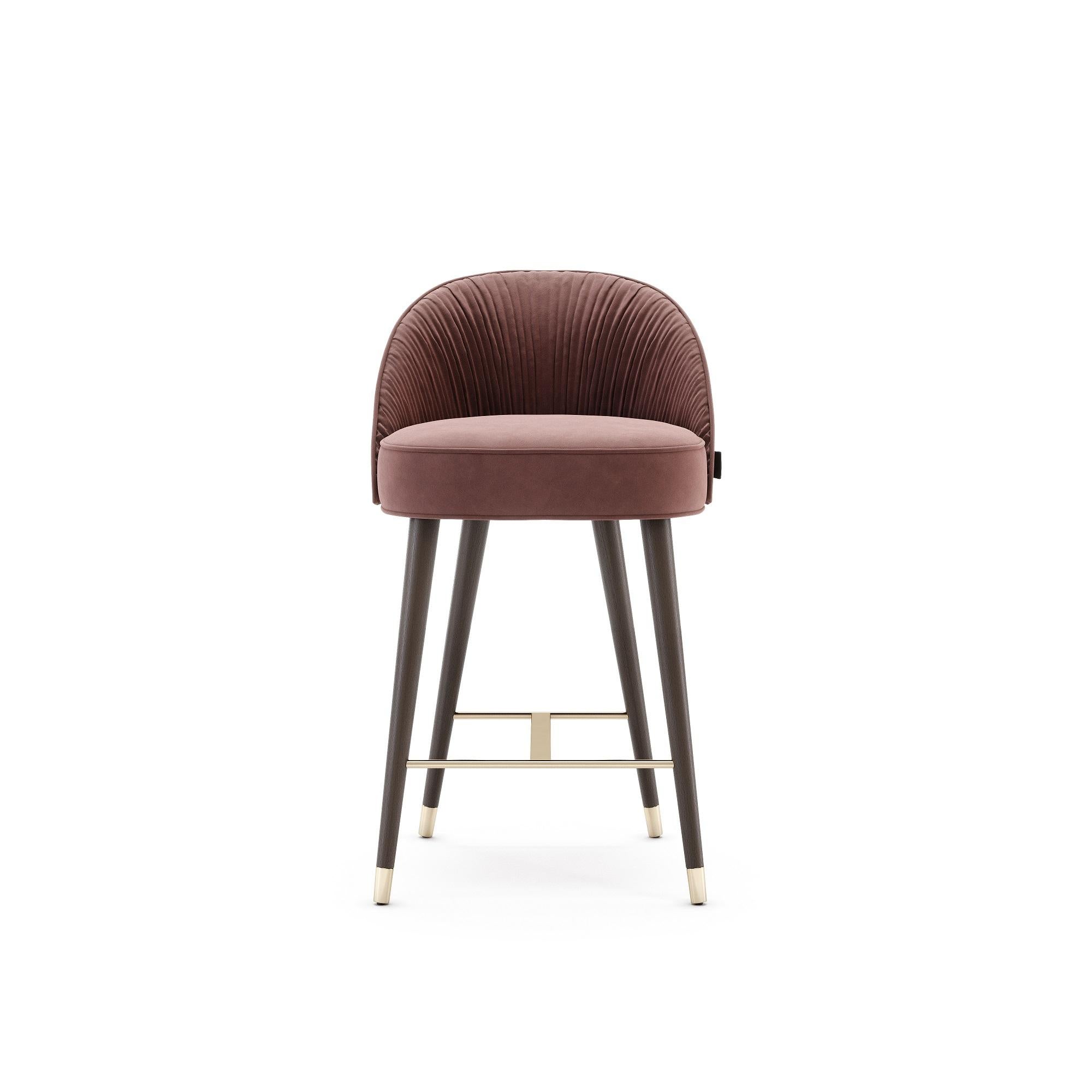 The contemporary counter chairs hold a stimulating design, as they hold an elegant combination of handmade couture techniques, wood, and metal. Their shapes are inspired by the unique French couture and each detail will elegantly flow inside of an