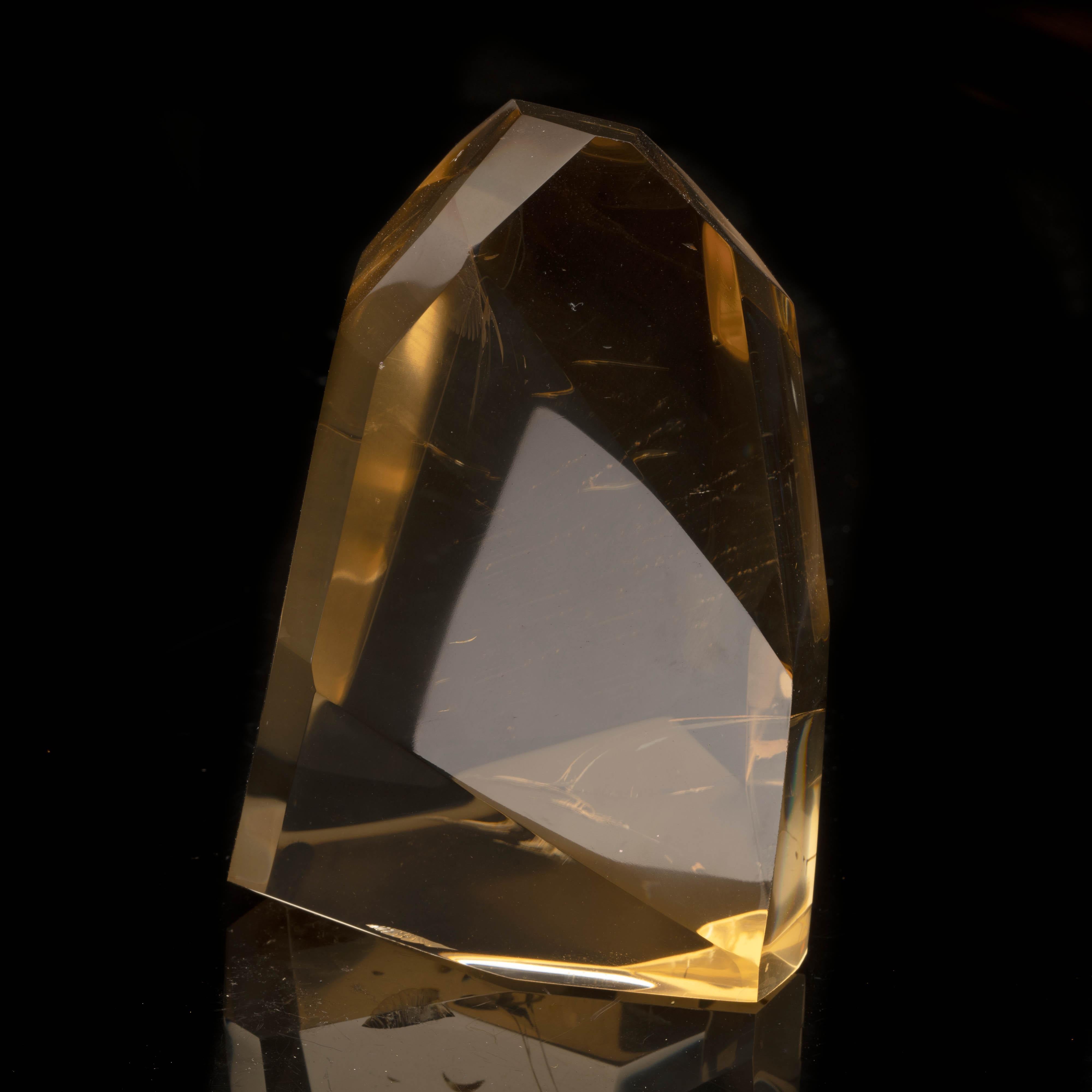 This gorgeous, lustrous, deeply-hued 1.75 lb citrine specimen – the finest genuine natural crystal from Madagascar – has been hand-polished into a unique freeform shape and features a nearly glass-clear interior. A standout piece to shine in any