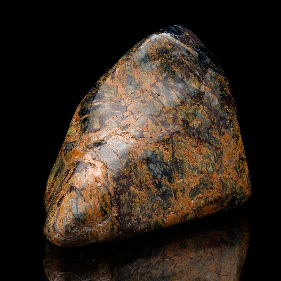 Pietersite is prized for its incredible chatoyancy and this specimen makes no exception. Hand-polished out of one solid piece of the rare mineral from the only location where it is found worldwide – a single source in Namibia – this stately freeform