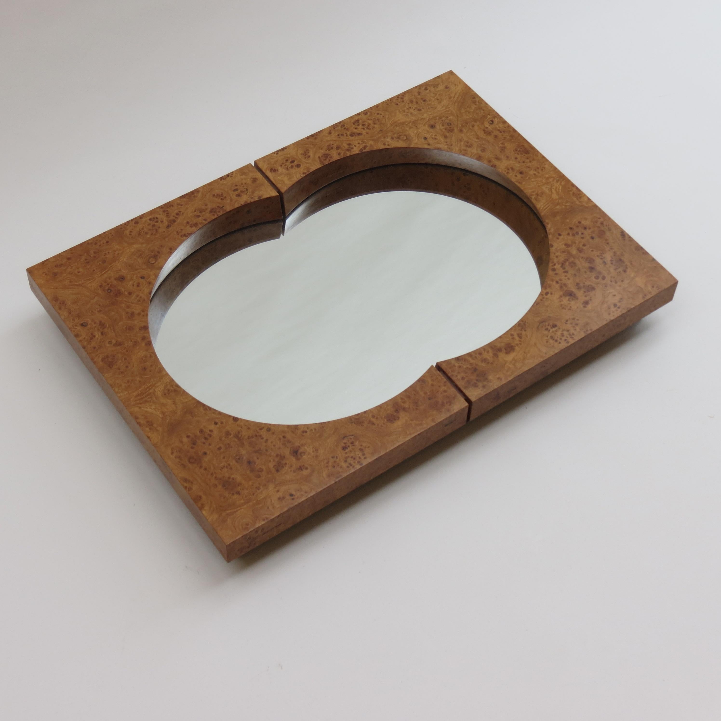 Wonderful mirror made from veneered burr elm, designed and hand produced by Desmond Ryan in the 1990s. Exceptional quality, very well made. Glass mirror plate.

In good condition. Stamped Desmond Ryan. 



 