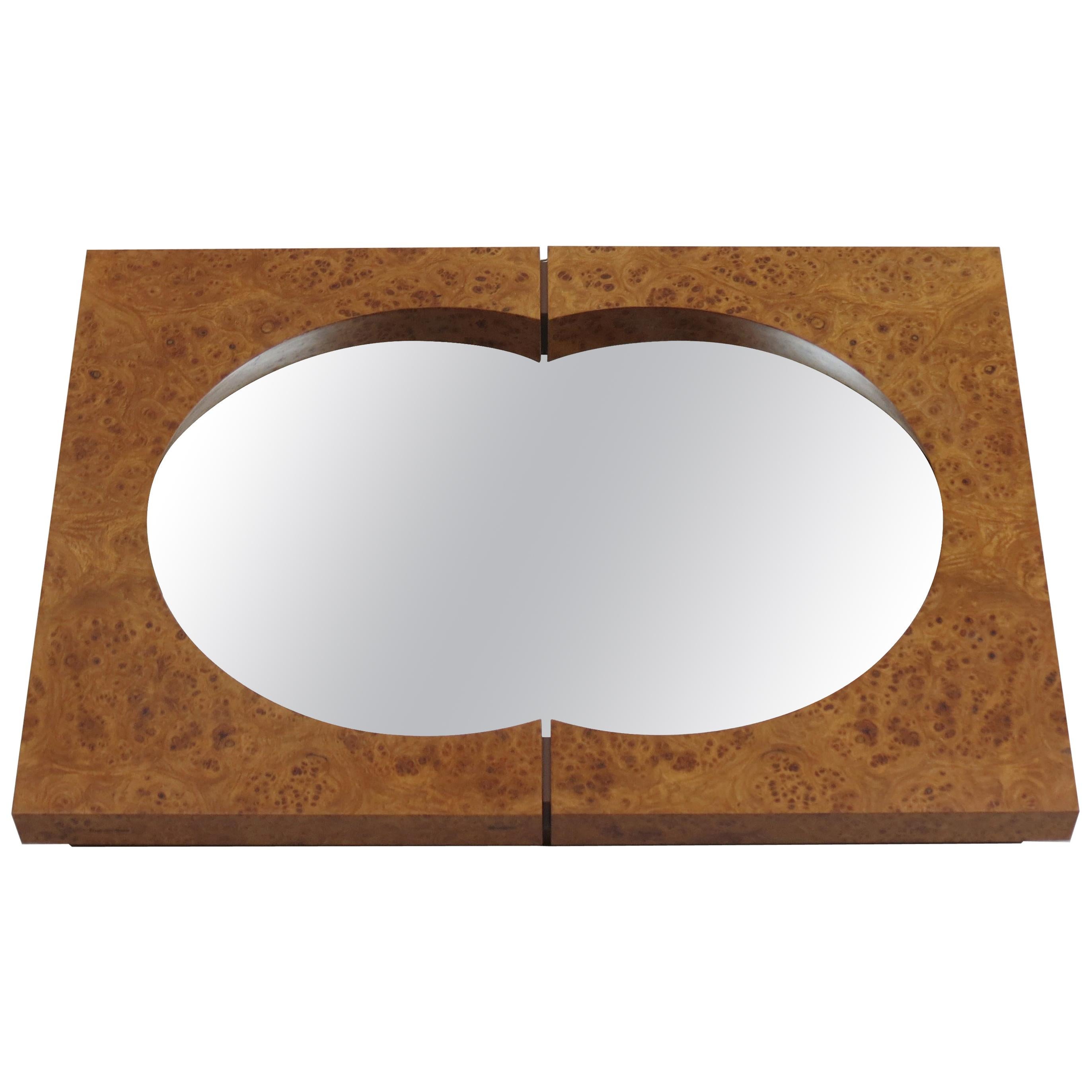 Wonderful wall mirror made from veneered burr elm, designed and hand produced by Desmond Ryan in the 1990s. Exceptional quality, very well made. Glass mirror plate.

In good condition. Stamped Desmond Ryan.



 