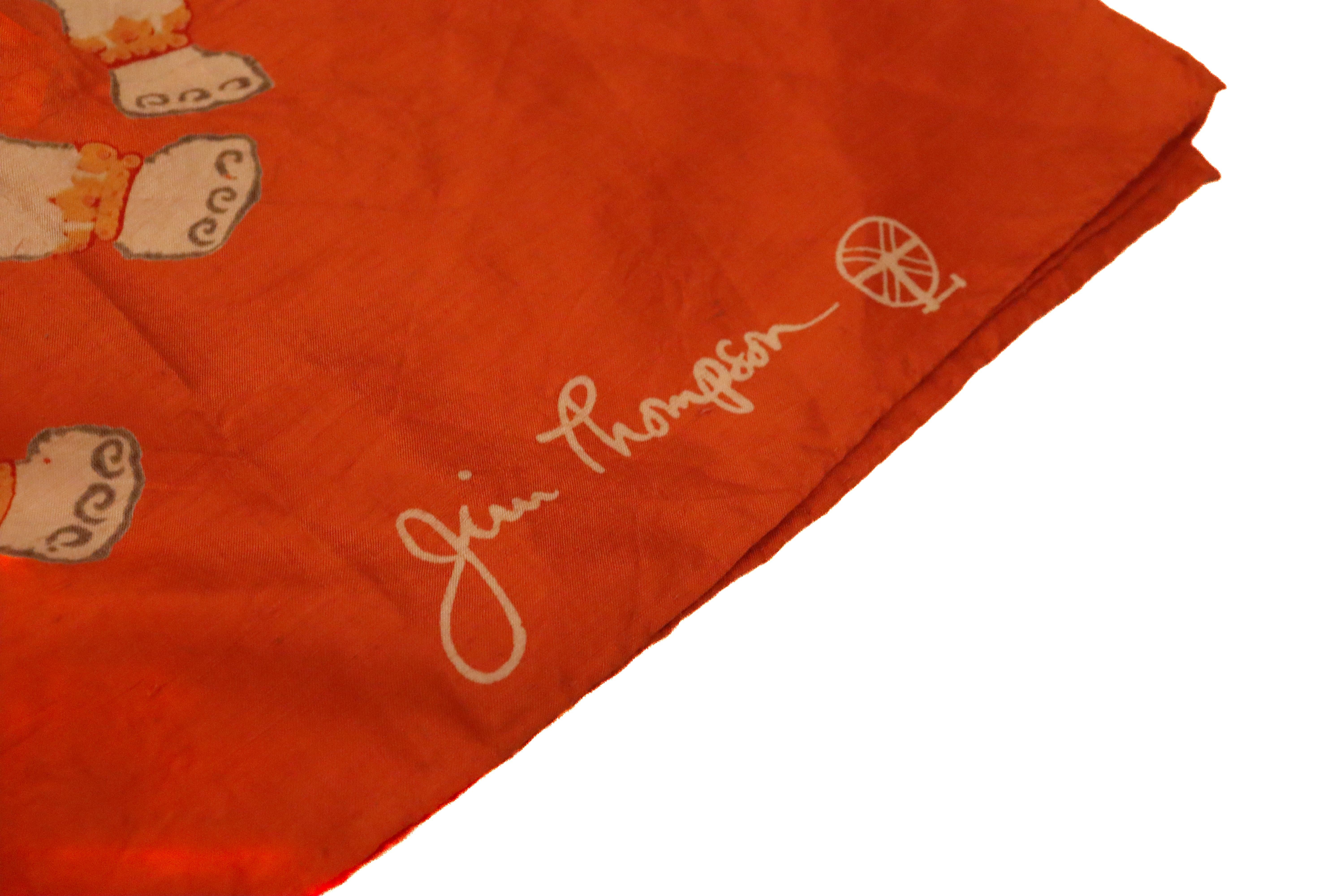 A wonderful silk scarf by Jim Thompson. In a super quality silk, the scarf has an orange background with elephant design.
Measurements: 35'' x 35''
