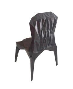 Sedia in legno di teak cristallino scolpito a mano