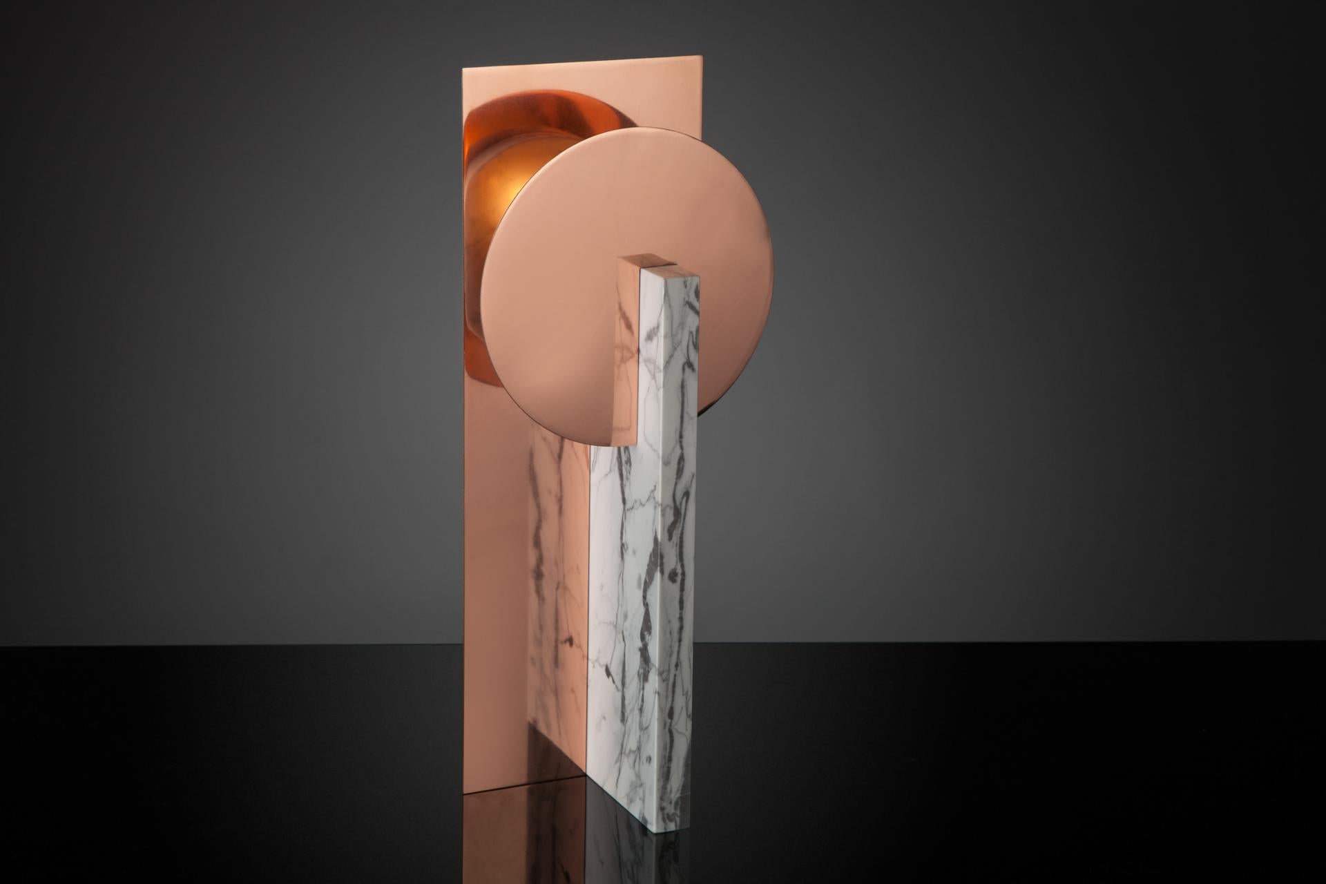 Hand-sculpted marble table lamp - Easy M
Materials: Copper sprayed polished stainless steel, marble, ash 
Dimensions: 38 x 13 x 12 cm
Light: G9 LED bulb.


SKELD Design is a contemporary design studio. 
We focus on interior lighting and