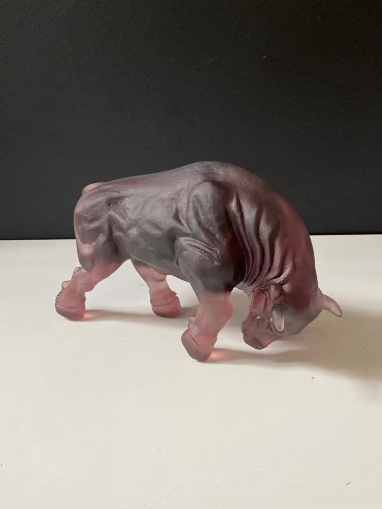 Unique cast glass amethyst color bull sculpture which is the latest edition to Fy-shan Glass Studio's Animal Kingdom collection, symbolizing masculinity, strength, power, determination and confidence. As a constellation, the bull, named Taurus, is