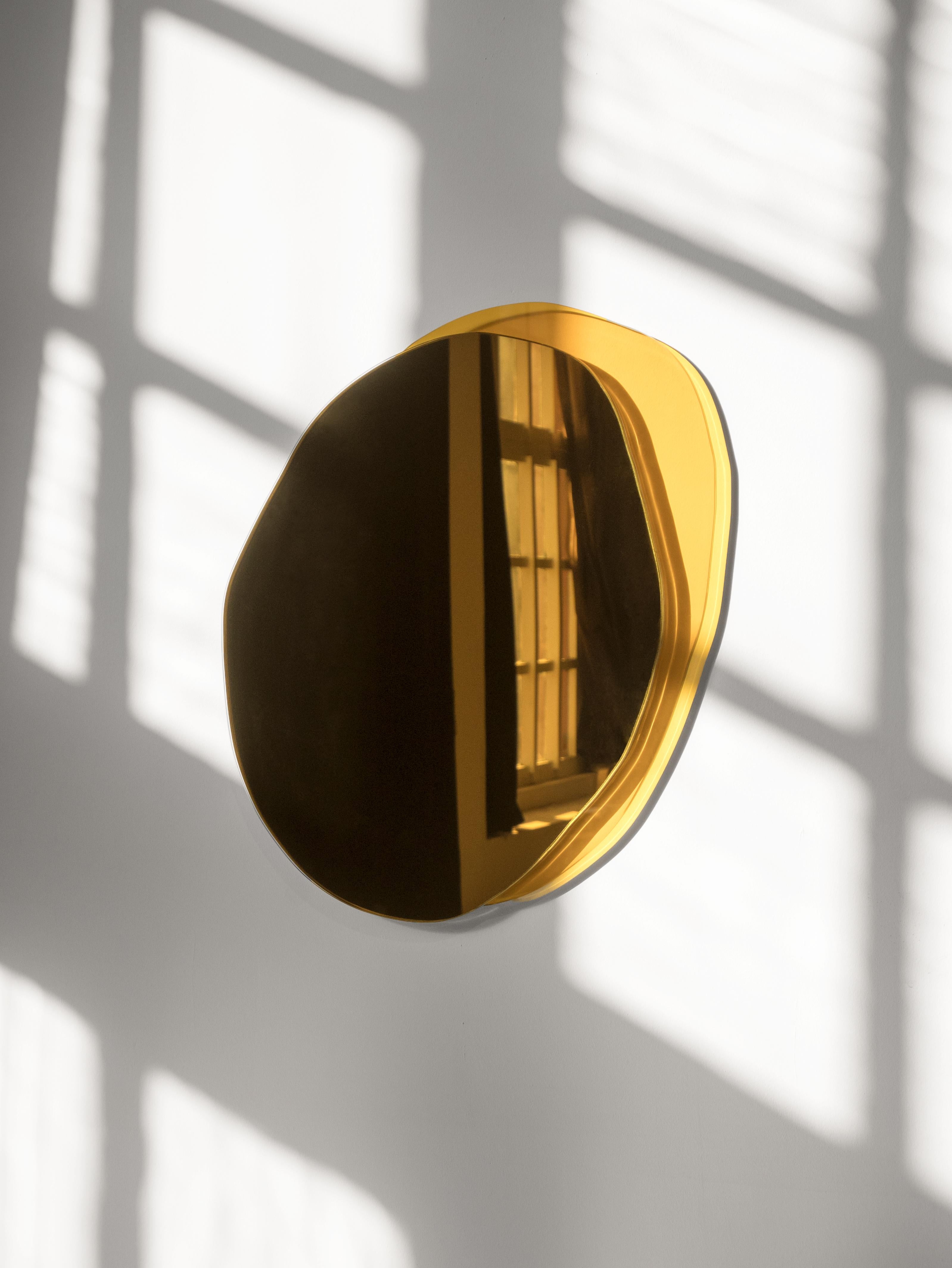 Hand-Sculpted Small Ombrée Mirror, Laurene Guarneri
Limited edition
Handmade
Gold mirror and yellow glass
Sizes : 100 x 80 x 2,5 cm
(Could be made to order in other dimensions)
Hang hook supplied

Laurène Guarneri is a designer based in