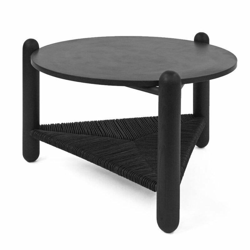 Hand-sculpted pair of The Captain’s table Nicholas Hamilton Holmes
Dimensions: 
30” diameter x 18” high
15'' x 20'' 
Materials: Blackened ash, soapstone and black Danish cord
Different finishes are available

This three legged table is built