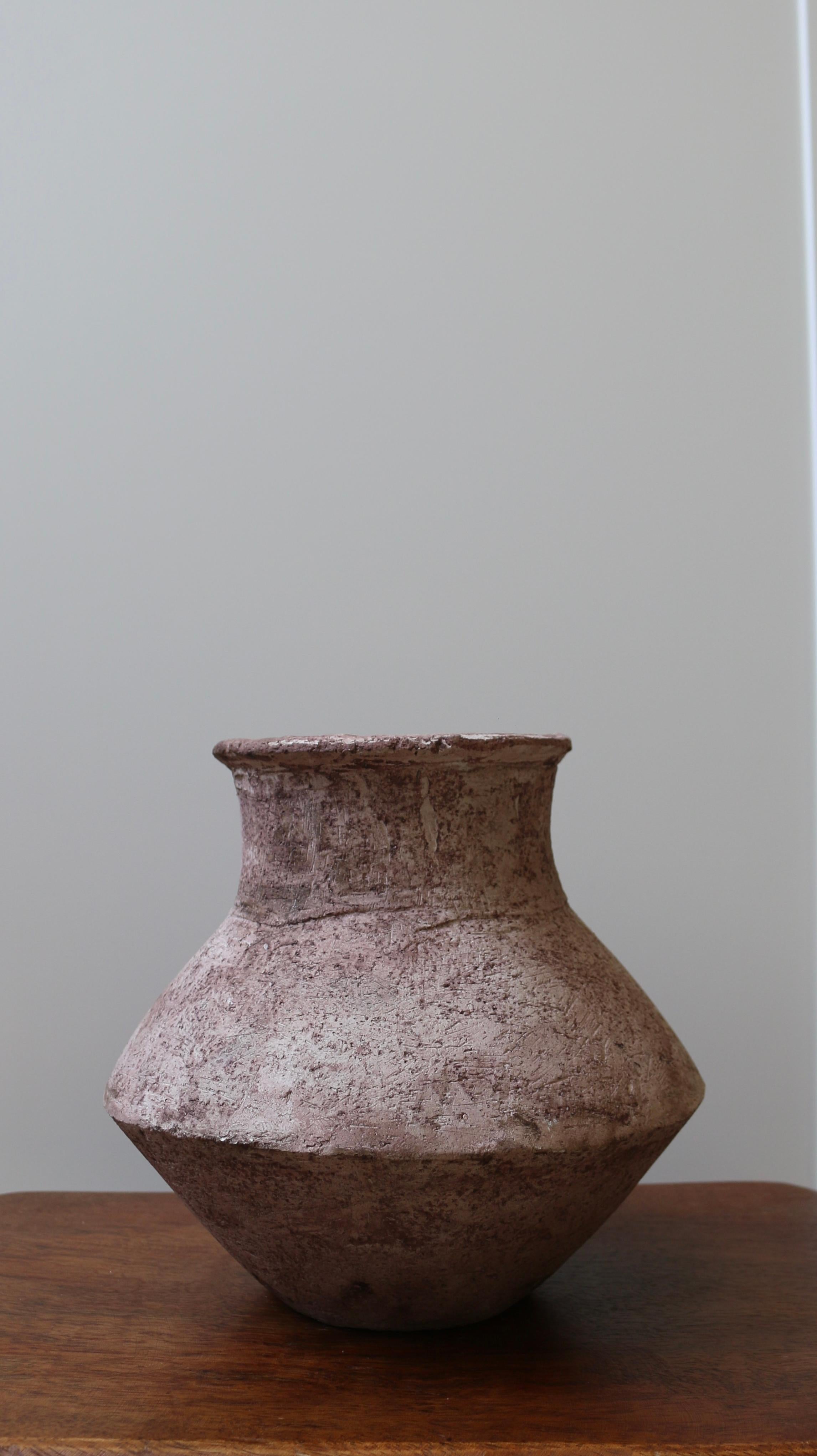 Crafted in cement and clay, the Vase Collection evokes the quiet strength of ancient vessels with a distinctly contemporary spirit. Each piece is sculpted to celebrate organic imperfection — no two are alike. The surface is layered with earthy