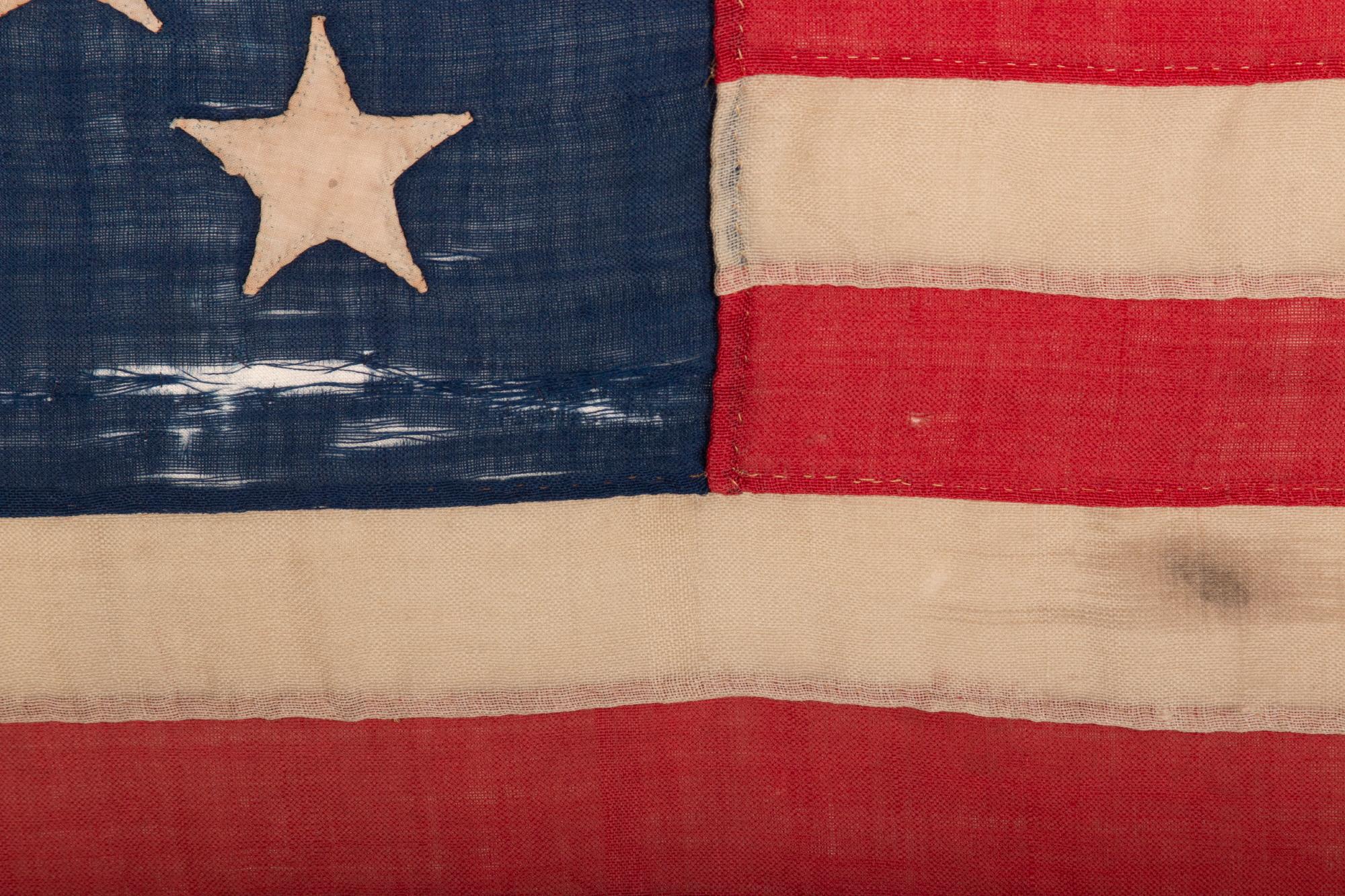 Handgenähte amerikanische Flagge mit 13 Sternen, signiert Grunfild, ca. 1861-1877 im Zustand „Gut“ im Angebot in York County, PA