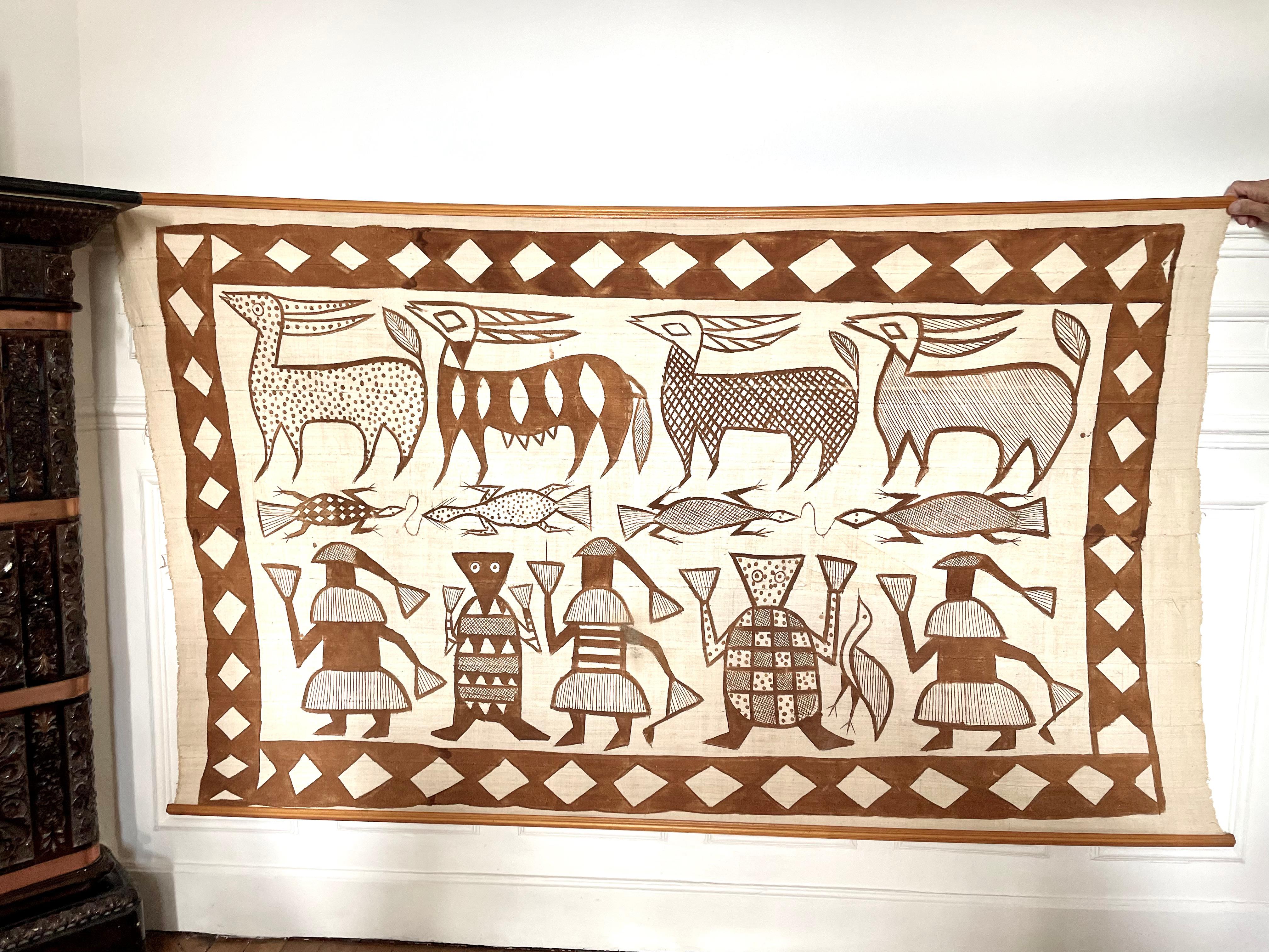 This is a hand spun, hand woven and hand painted cotton cloth for which an entire famous African village takes part in its creation. Women of the Korhoga Tribe spin the cotton, while the men weave and sew the cloth into a large canvas. Korhogo cloth