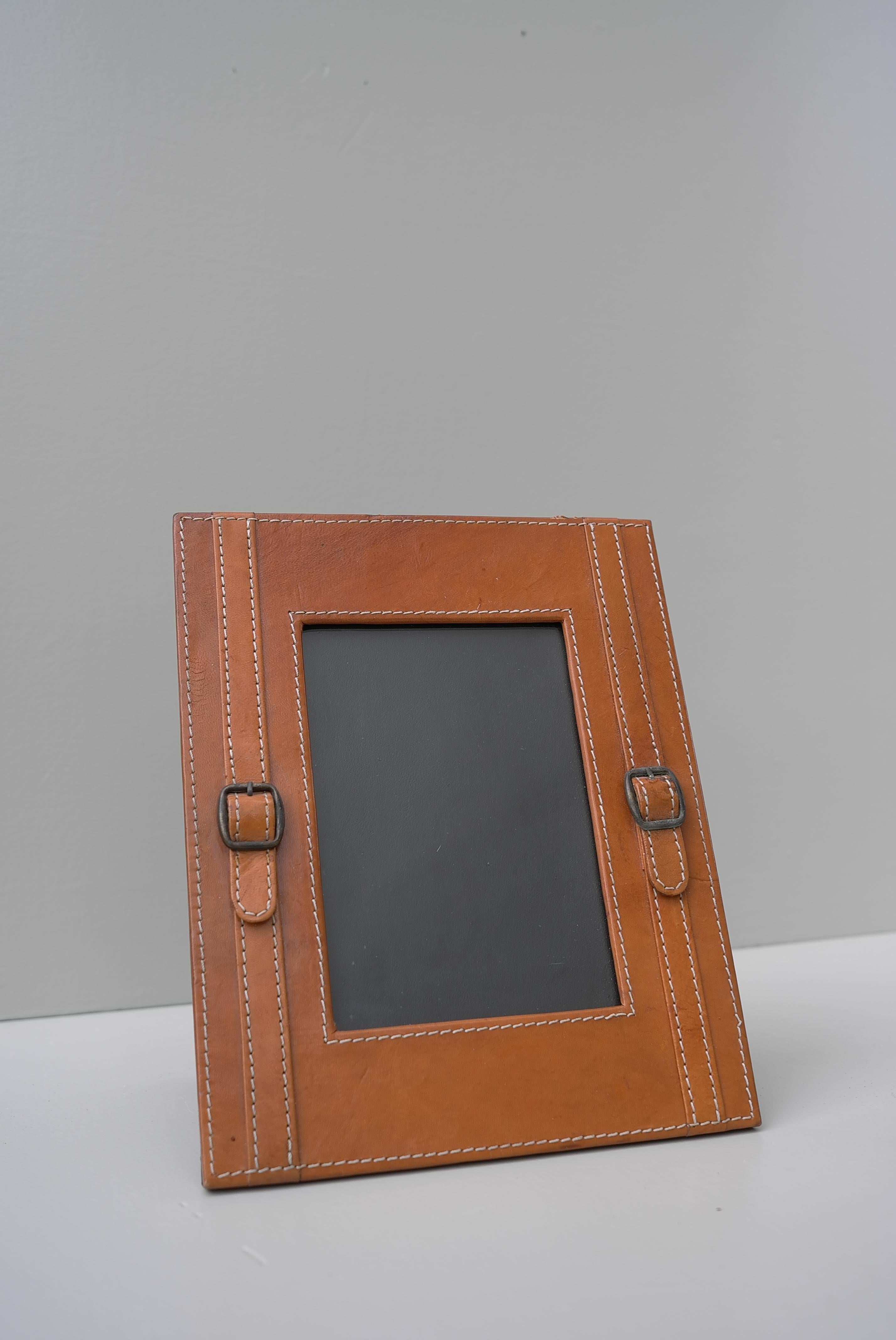 Hand-stitched green leather picture frame in style of Jacques Adnet.