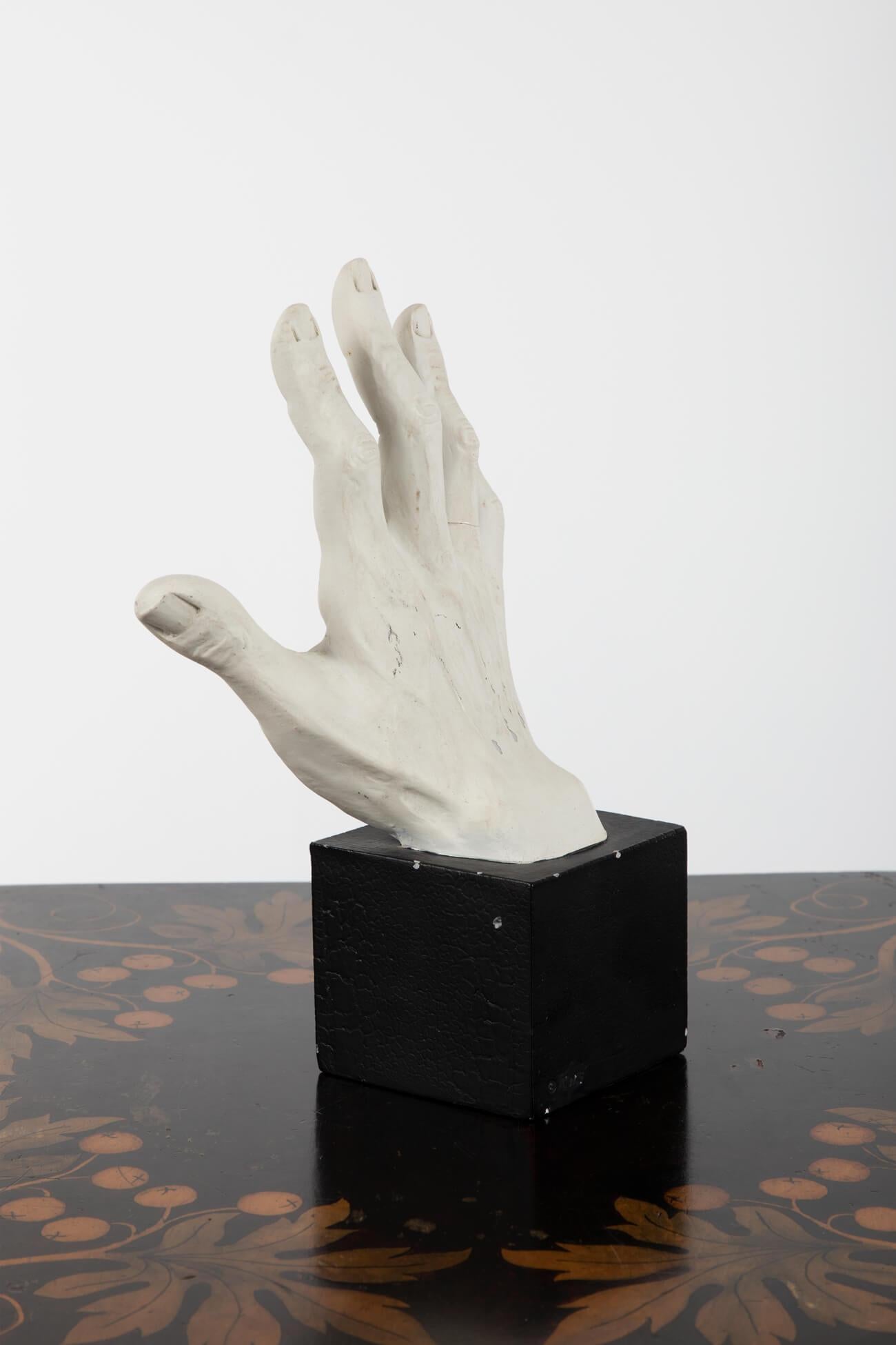 Anatomical plaster study of a man’s hand, sitting on an oak plinth base. With wonderful definition to the fingers and palm. 
British, early 20th century.

Additional information:
H 27 cm (H 10.6 inches)
W 15 cm (W 5.9 inches)
D 9 cm (D 3.5