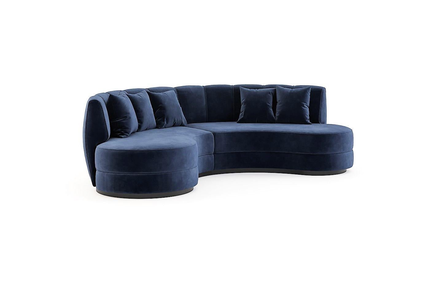 Mid-Century Modern inspired sectional sofa featuring curved design with luxurious blueberry blue cotton velvet fabric. Supported by smoked eucalyptus wood base.
Standard dimensions:
293 cm x 157 cm x 84 cm
Finishes:
Fabrics: Cotton Velvet Ref: Deep