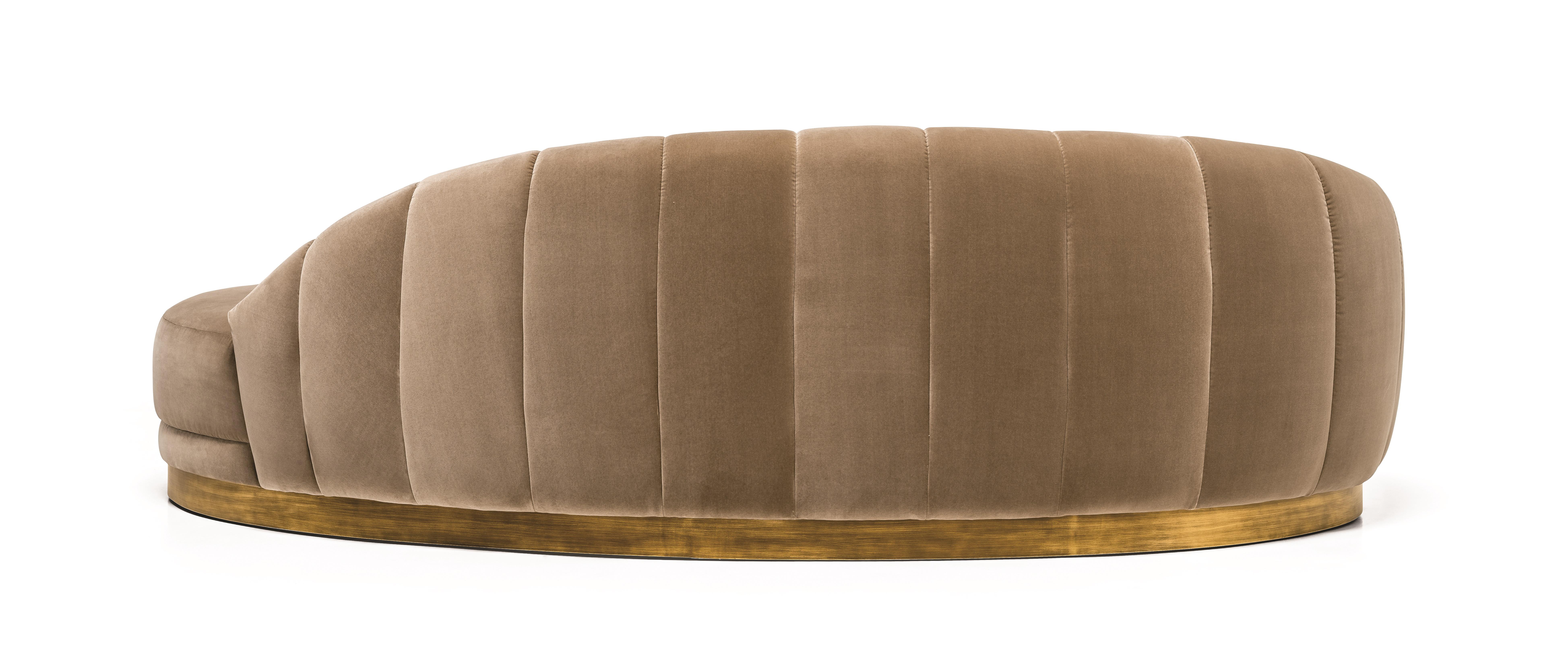 Contemporary retro style sofa in beige latte velvet.
Plinth antique brushed brass.
All hardwood frame with interlocking construction.
Advanced comfort spring suspension.
Tight seat and back with premium polyurethane foam with generous multi-density