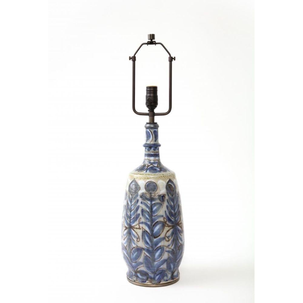 Hand-Thrown and Painted Glazed Ceramic Table Lamp, Keraluc, France

Tall, hand-thrown ceramic table lamp with expressive, hand-applied glaze in indigo blue, cream, and rust.

