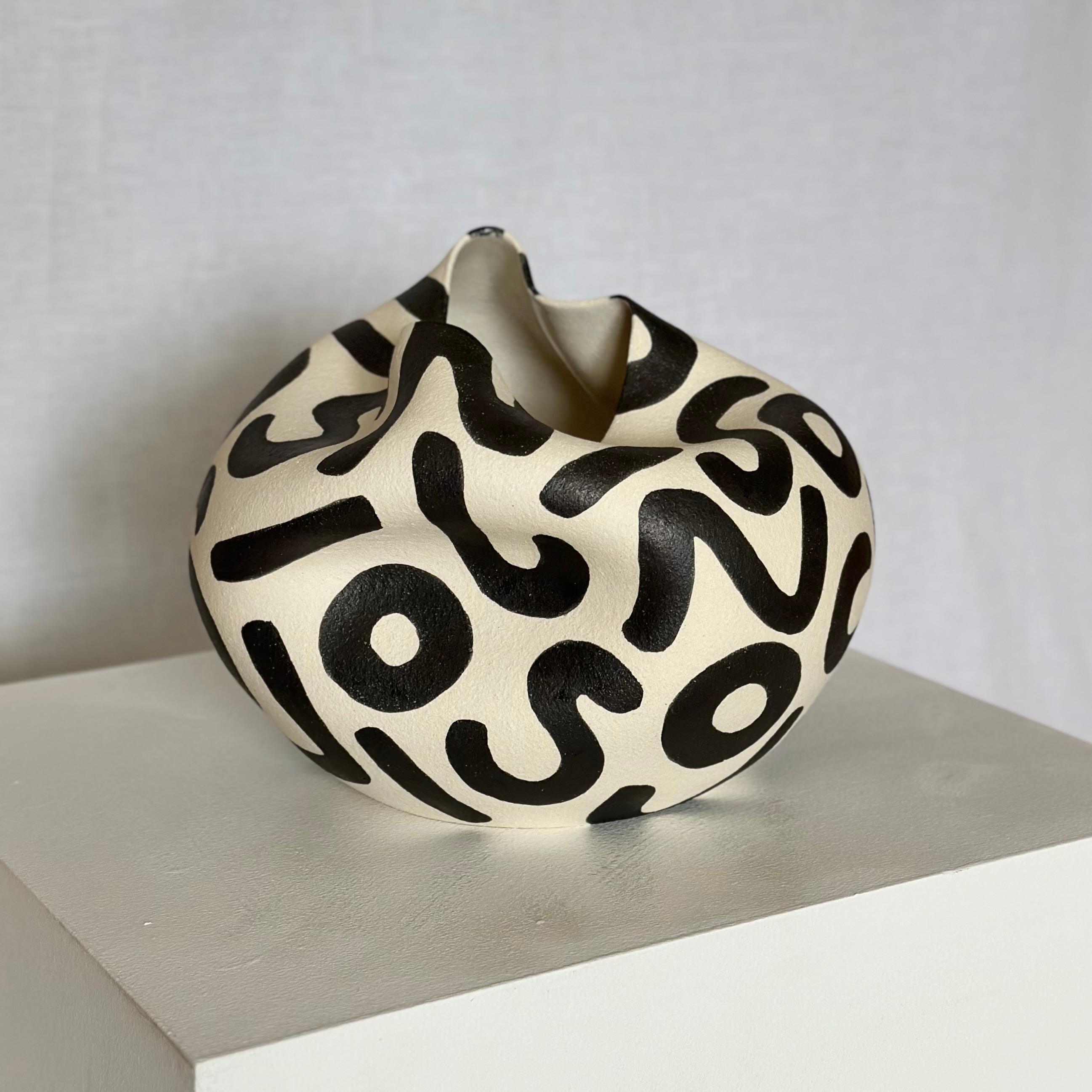 Hand thrown and altered ceramic vase by Norwegian artist Johanne Birkeland.

Birkeland, who works under the artist name Jossolini, is known for her special techniques in altering her wheel thrown forms. 

Once the form has been thrown and trimmed at