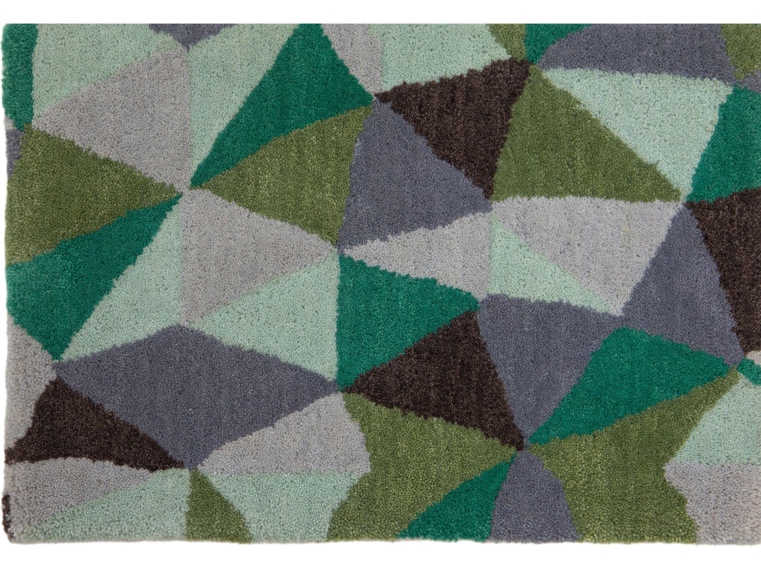 Laura Gottwald for Apadana Collection

A kaleidoscopic repeat pattern of free-hand triangles, Mosaico is reminiscent of 1920’s American folk art shardware (a.k.a.“bits & pieces”).

Our rugs are fabricated from virgin Persian wool, hand-dyed in